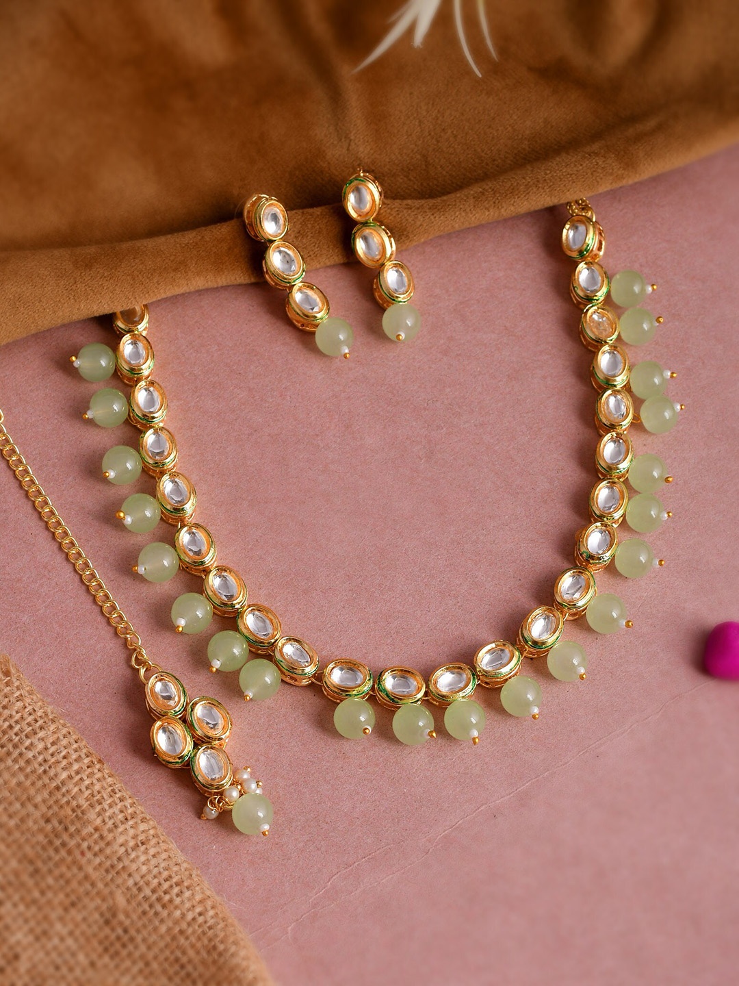 

Shoshaa Gold-Plated Gold-Toned Pink Kundan Studded Jewellery Set