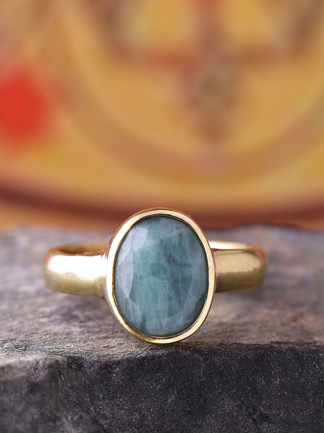 

Voylla Gold-Plated Green Panna Stone Studded Ashtadhatu Rashi Ratna Finger Ring