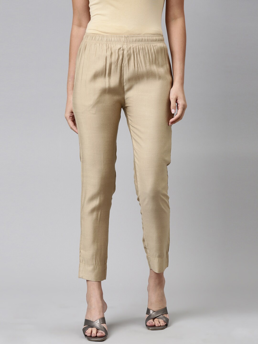 

Go Colors Women Gold-Toned Tapered Fit Trousers
