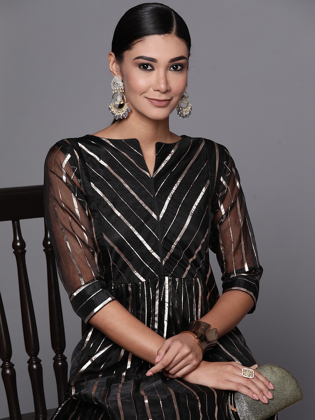 

Inddus Women Black Kurta with Trousers