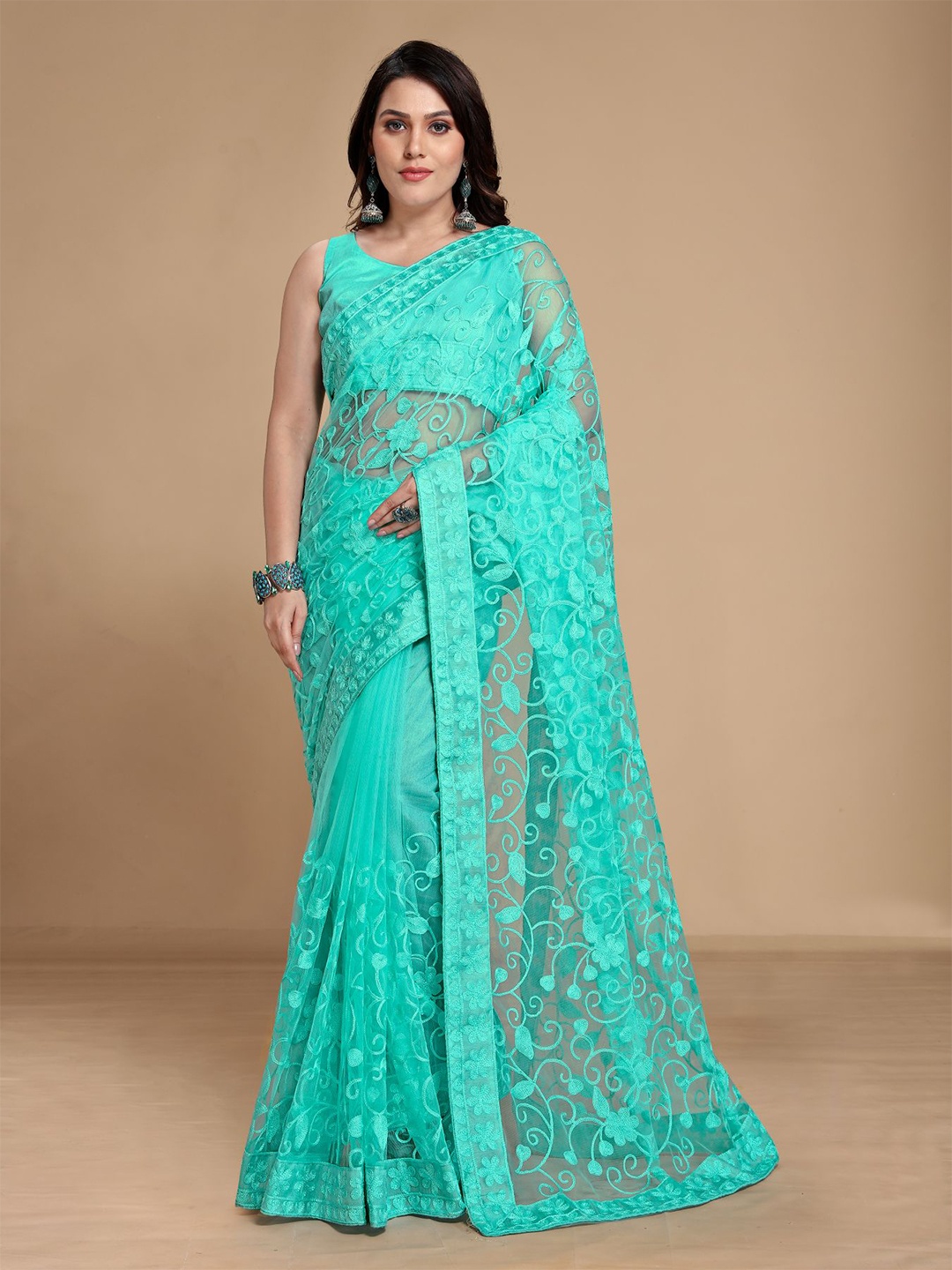 

VAIRAGEE Turquoise Blue Floral Embroidered Net Saree