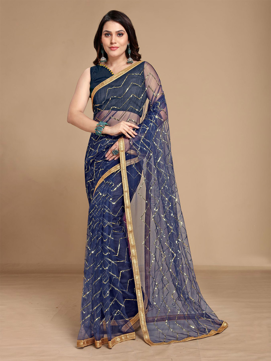 

VAIRAGEE Blue & Gold-Toned Embellished Sequinned Net Saree