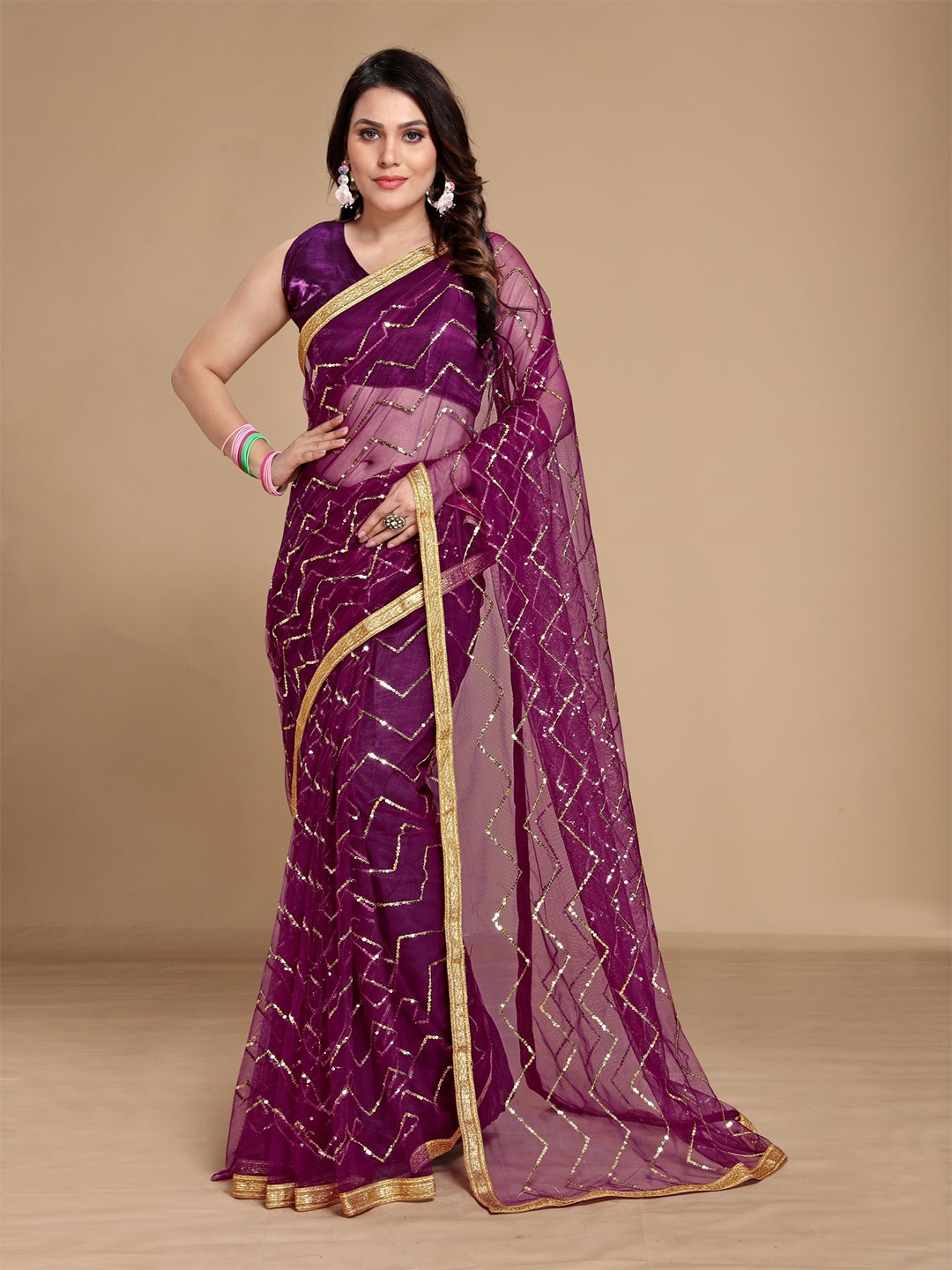 

VAIRAGEE Purple & Gold-Toned Embellished Sequinned Net Saree