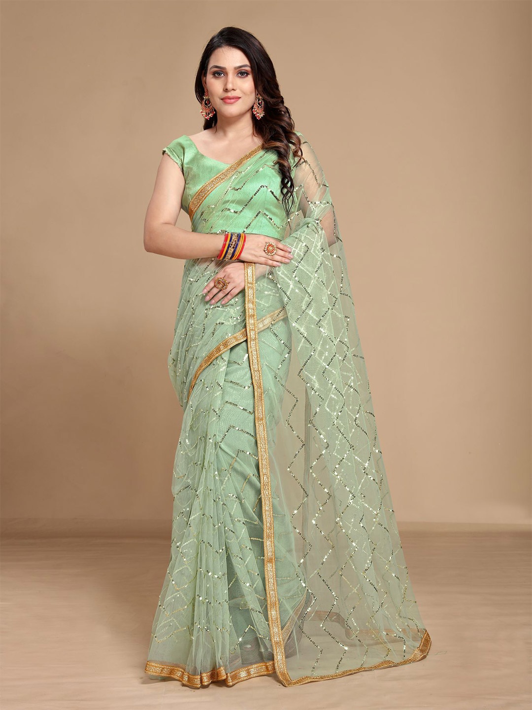 

VAIRAGEE Turquoise Blue & Gold-Toned Net Saree