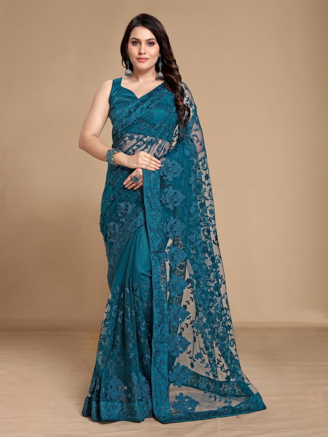 

VAIRAGEE Teal Embellished Net Saree