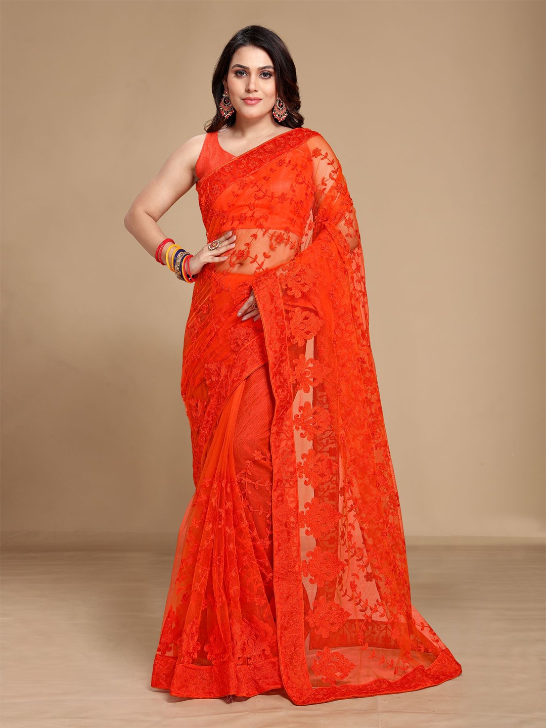 

VAIRAGEE Orange Ethnic Motifs Embroidered Net Saree