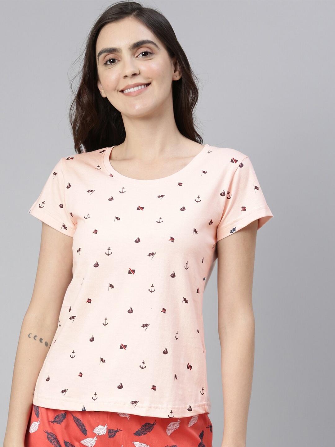 

Kryptic Women Peach-Coloured Printed T-shirt