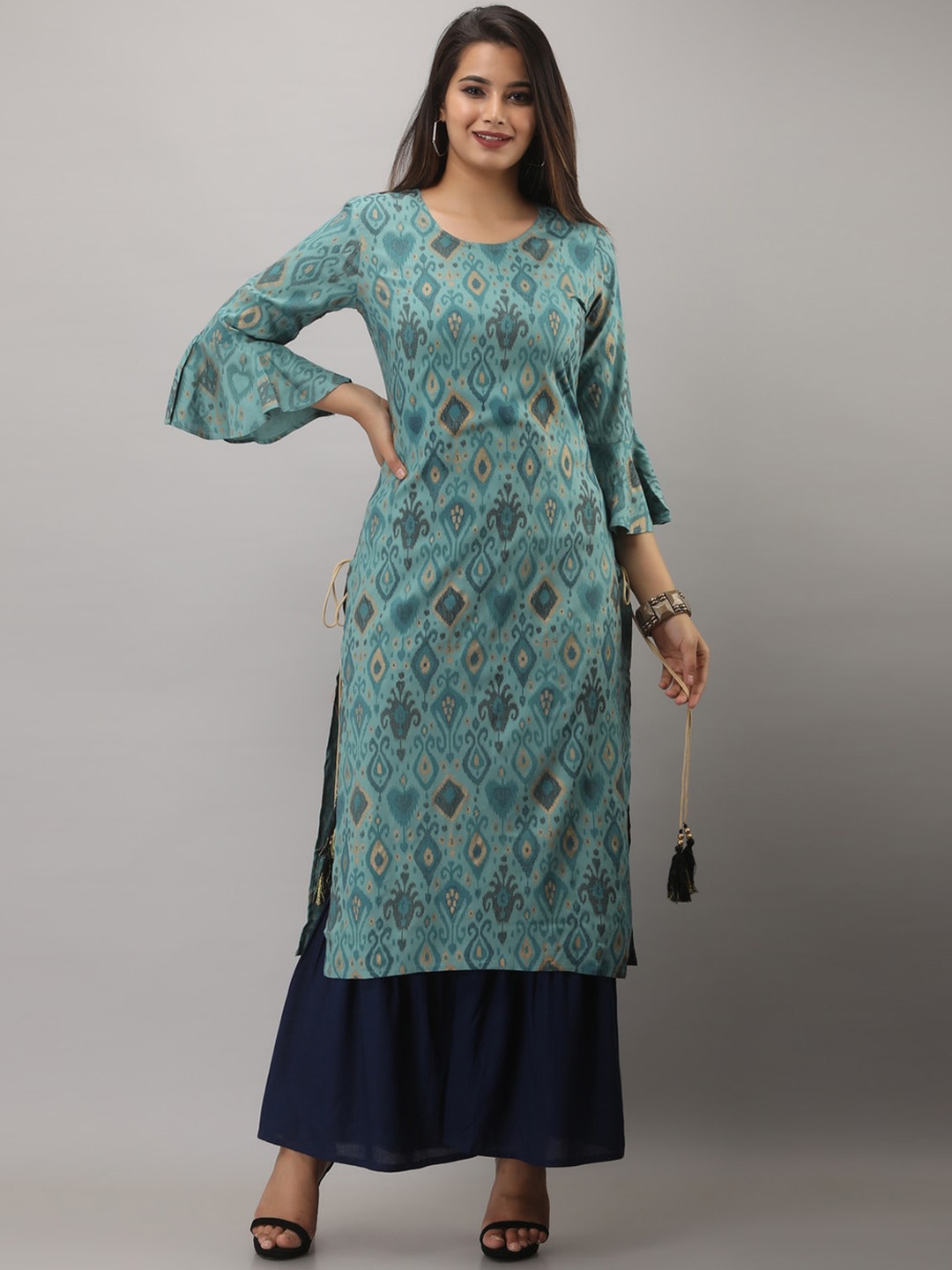 

MAUKA Women Sea Green Ethnic Motifs Layered Kurti with Sharara