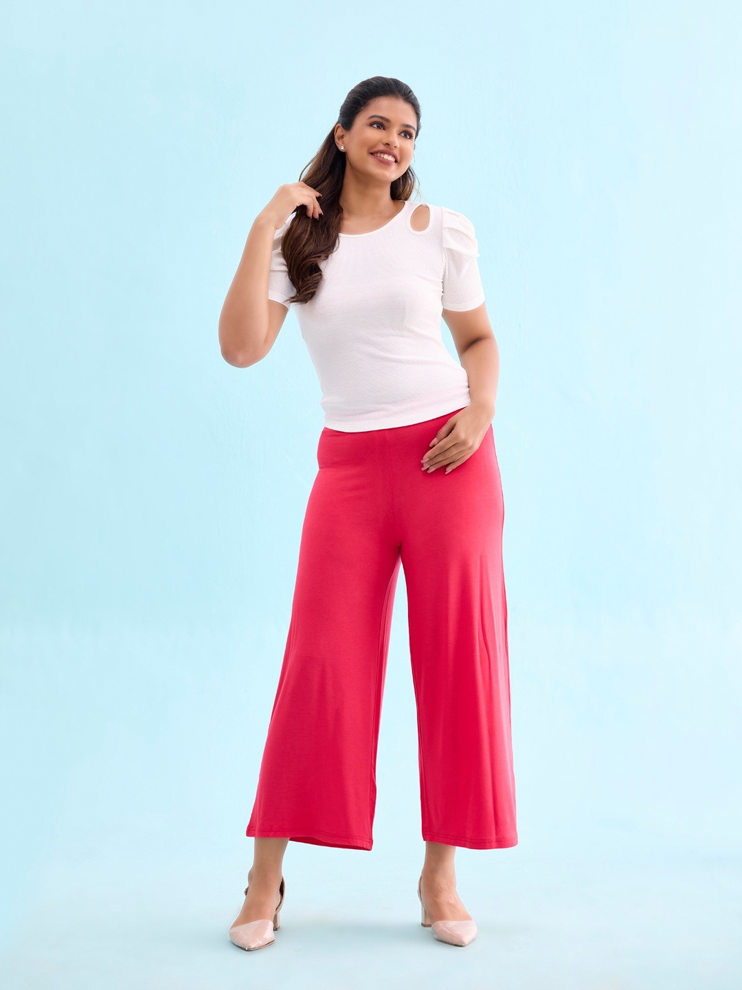 

Go Colors Women Coral Flared Knitted Palazzos