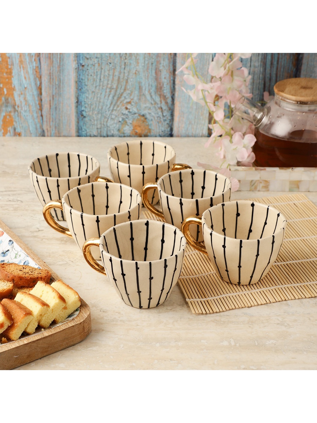 

The Decor Mart Beige & Black Printed Ceramic Glossy Mugs Set of Cups and Mugs