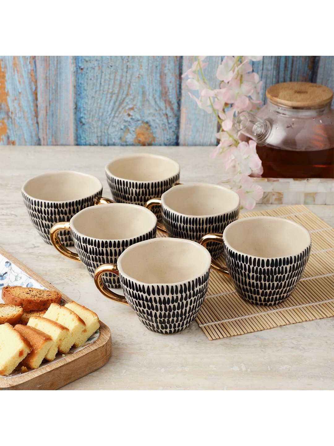 

The Decor Mart Cream-Coloured & Black Printed Ceramic Glossy Mugs Set of Cups and Mugs