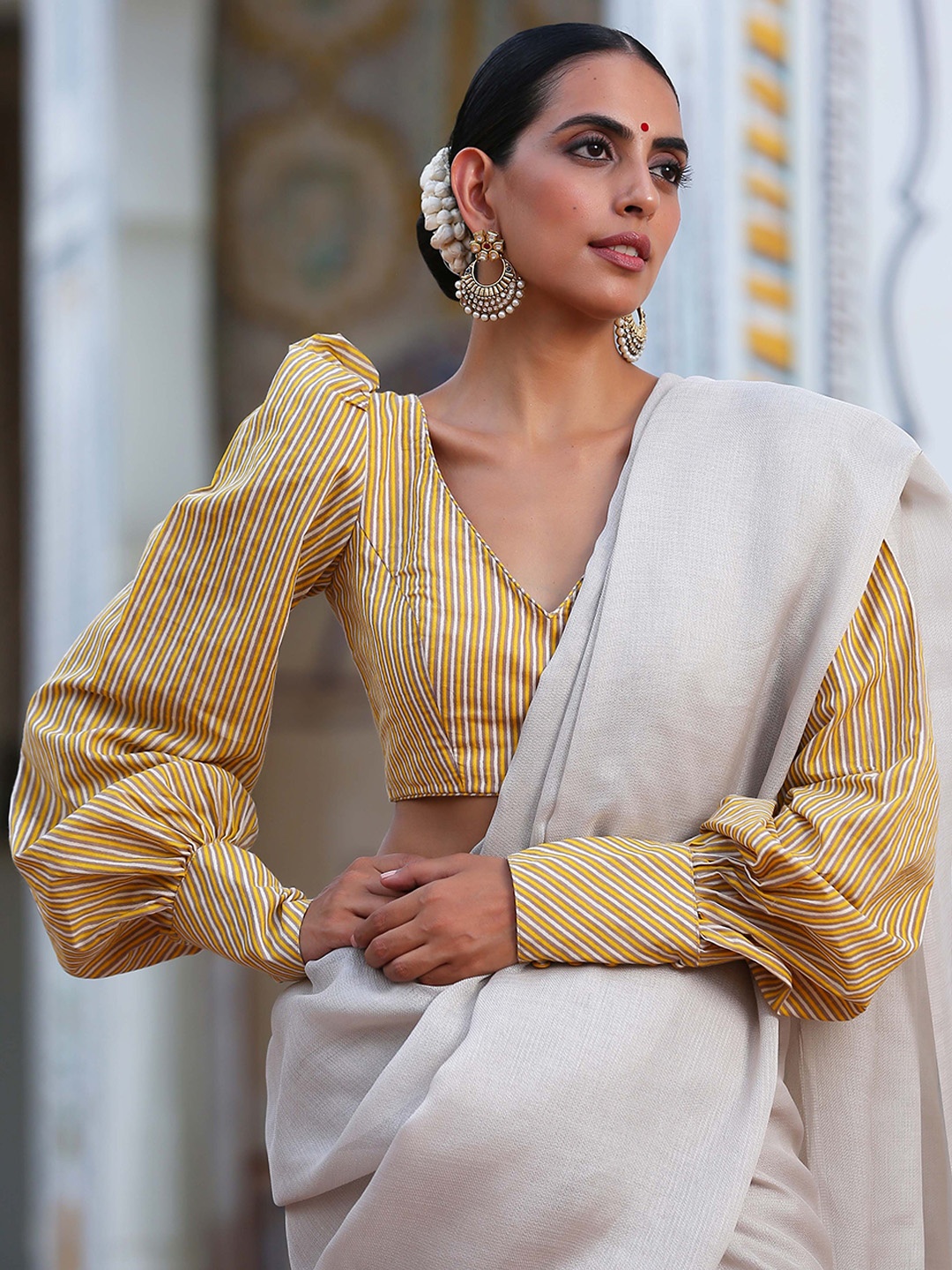 

Triyah Yellow Cotton Saree Blouse