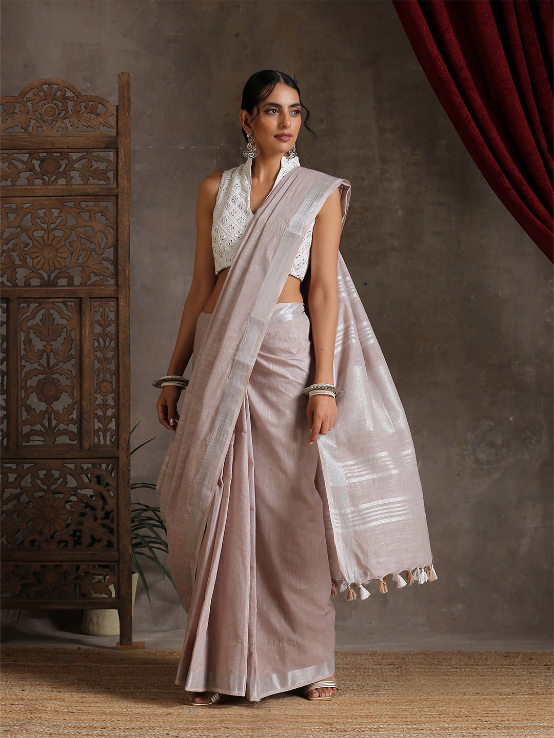 

Triyah Beige & Silver-Toned Zari Linen Blend Saree