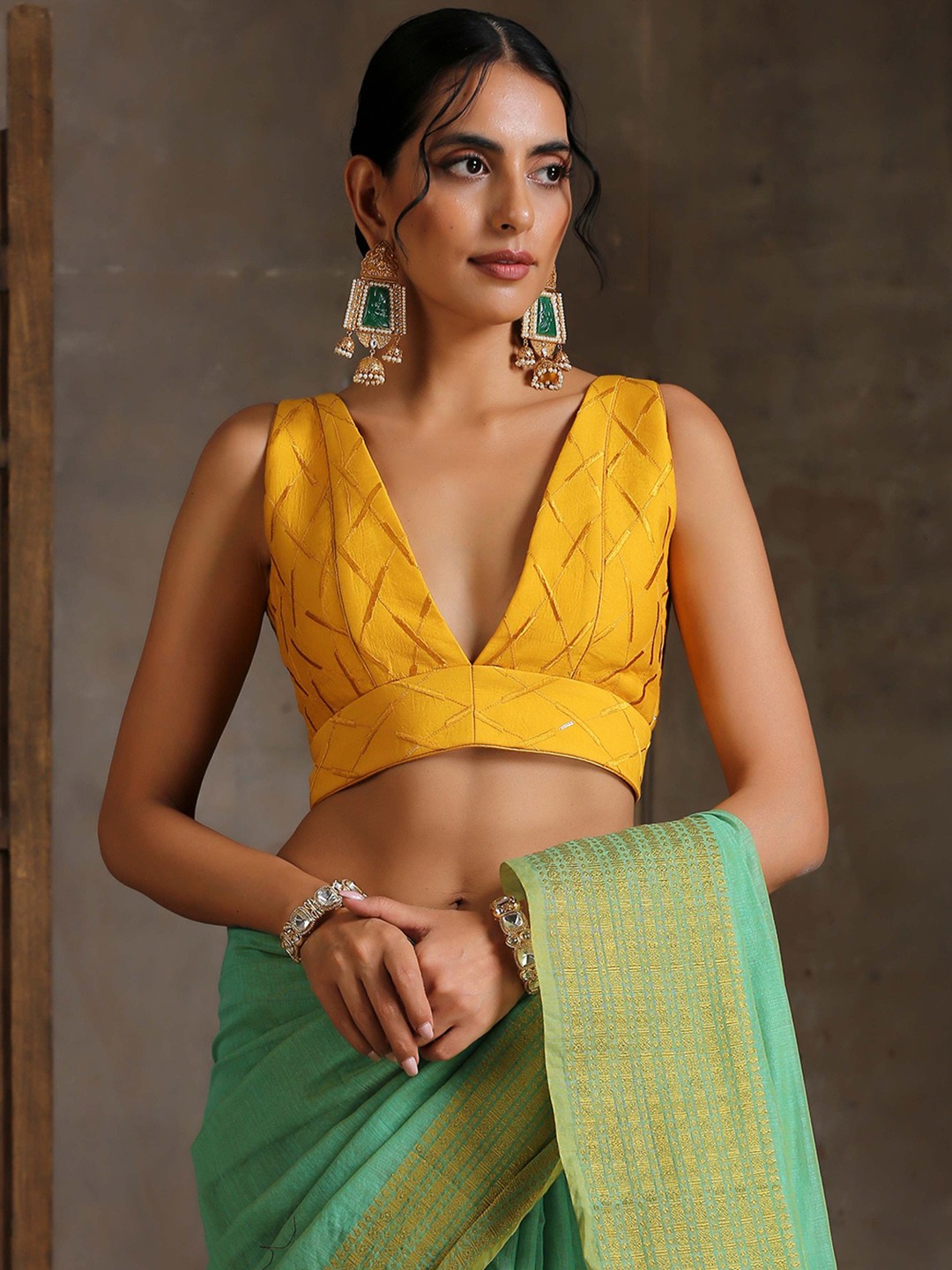 

Triyah Yellow Embroidered Saree Blouse