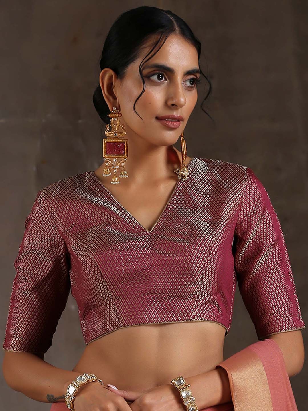 

Triyah Women Burgundy Embellished Saree Blouse