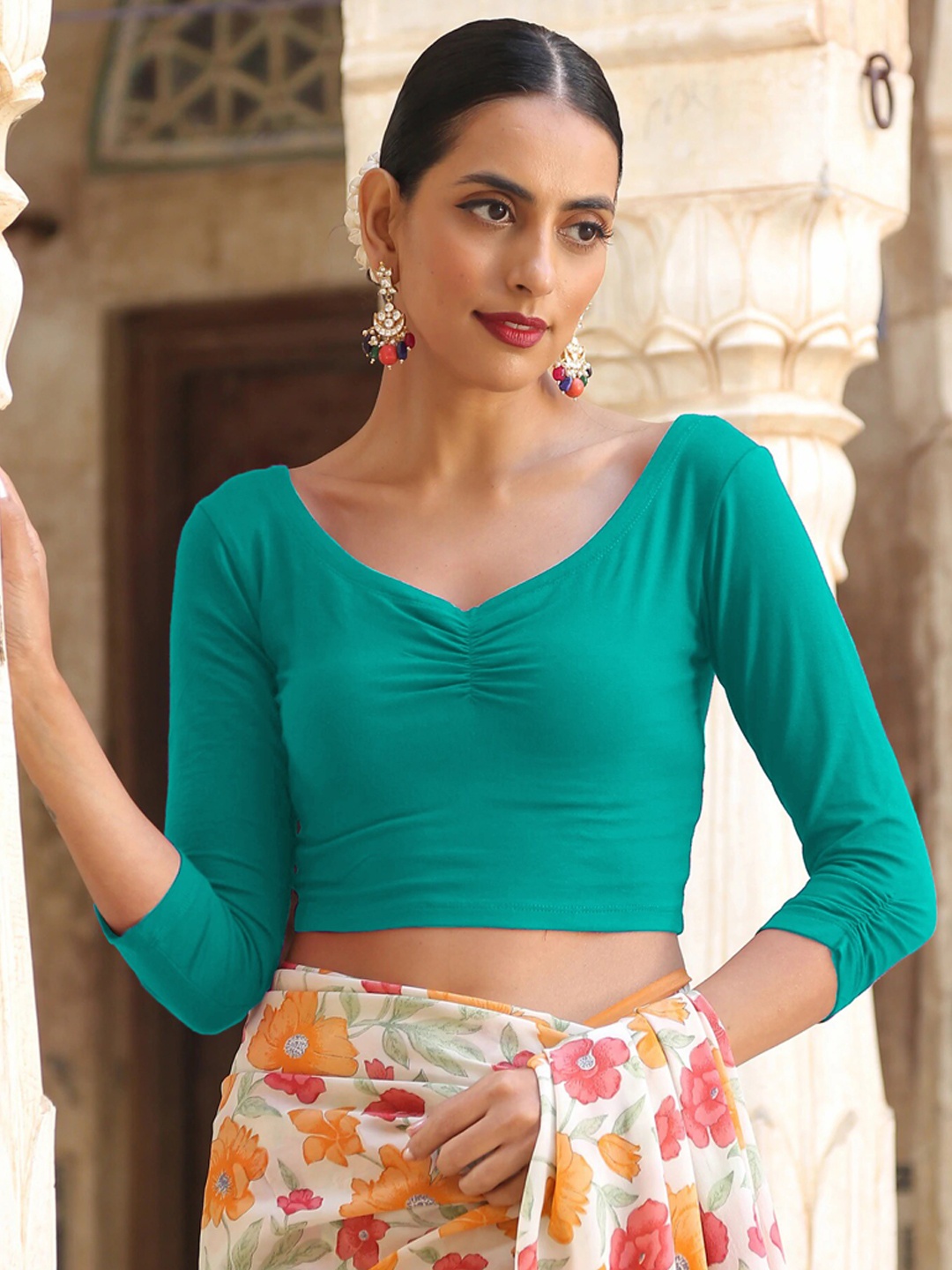 

Triyah Turquoise Blue Solid Saree Blouse