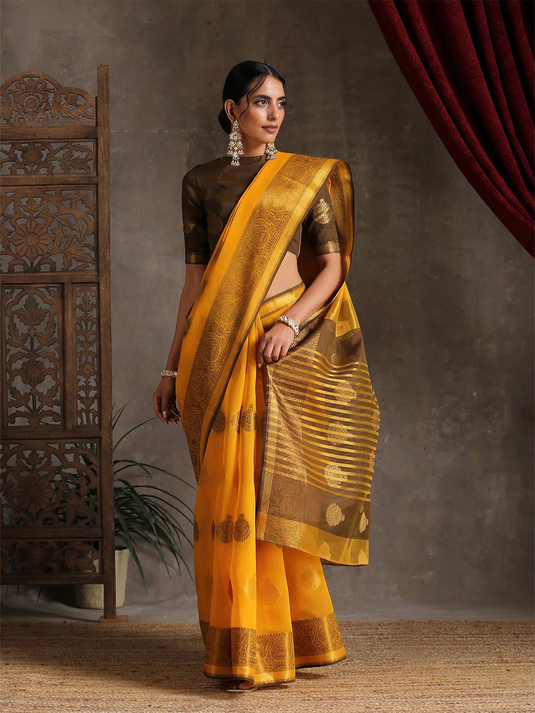 

Triyah Yellow & Gold-Toned Woven Design Zari Pure Cotton Saree