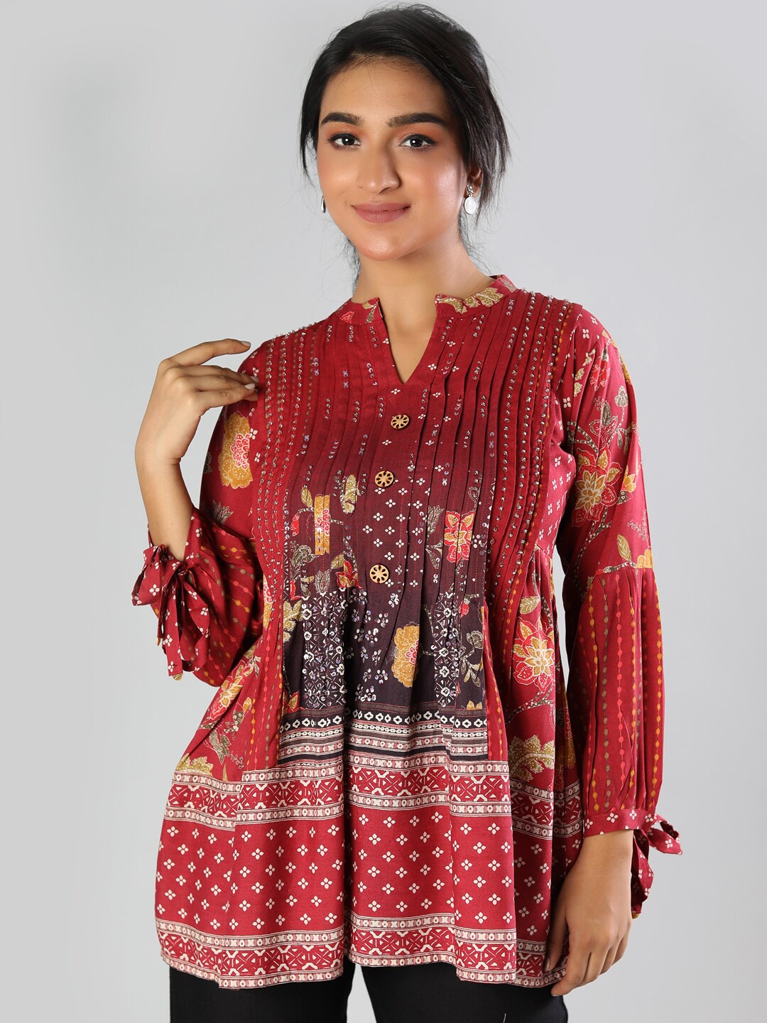 

taruni Maroon Floral Printed V-Neck Modal Panelled Kurti