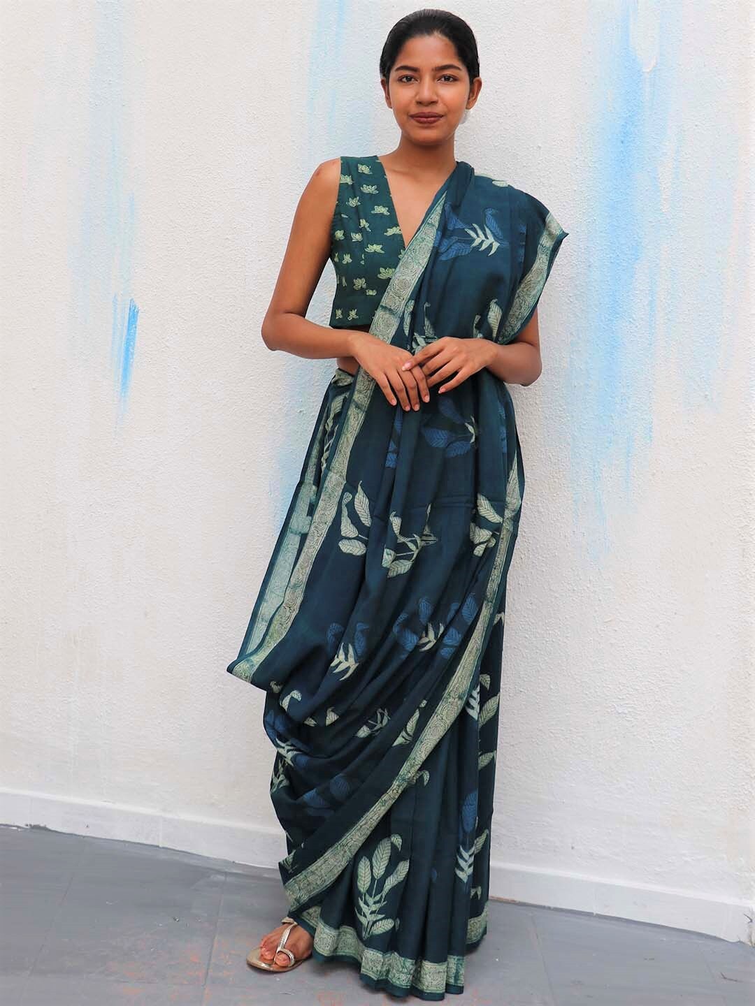 

Chidiyaa Teal Green & White Floral Pure Cotton Block Print Saree