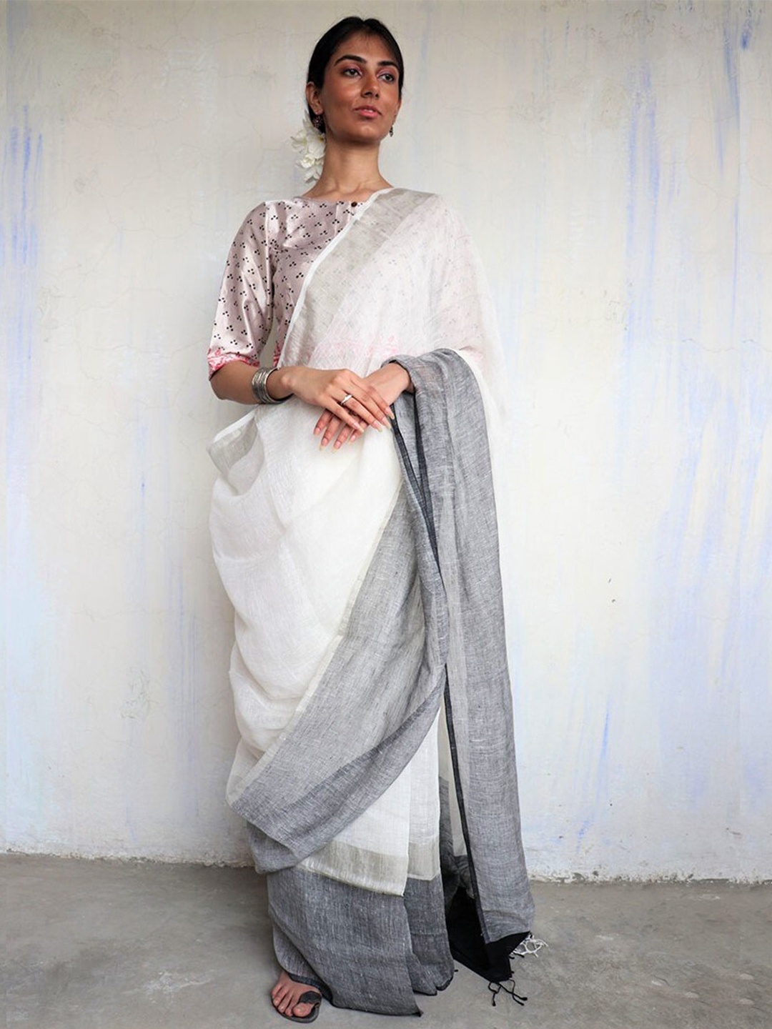 

Chidiyaa Grey & White Pure Linen Saree