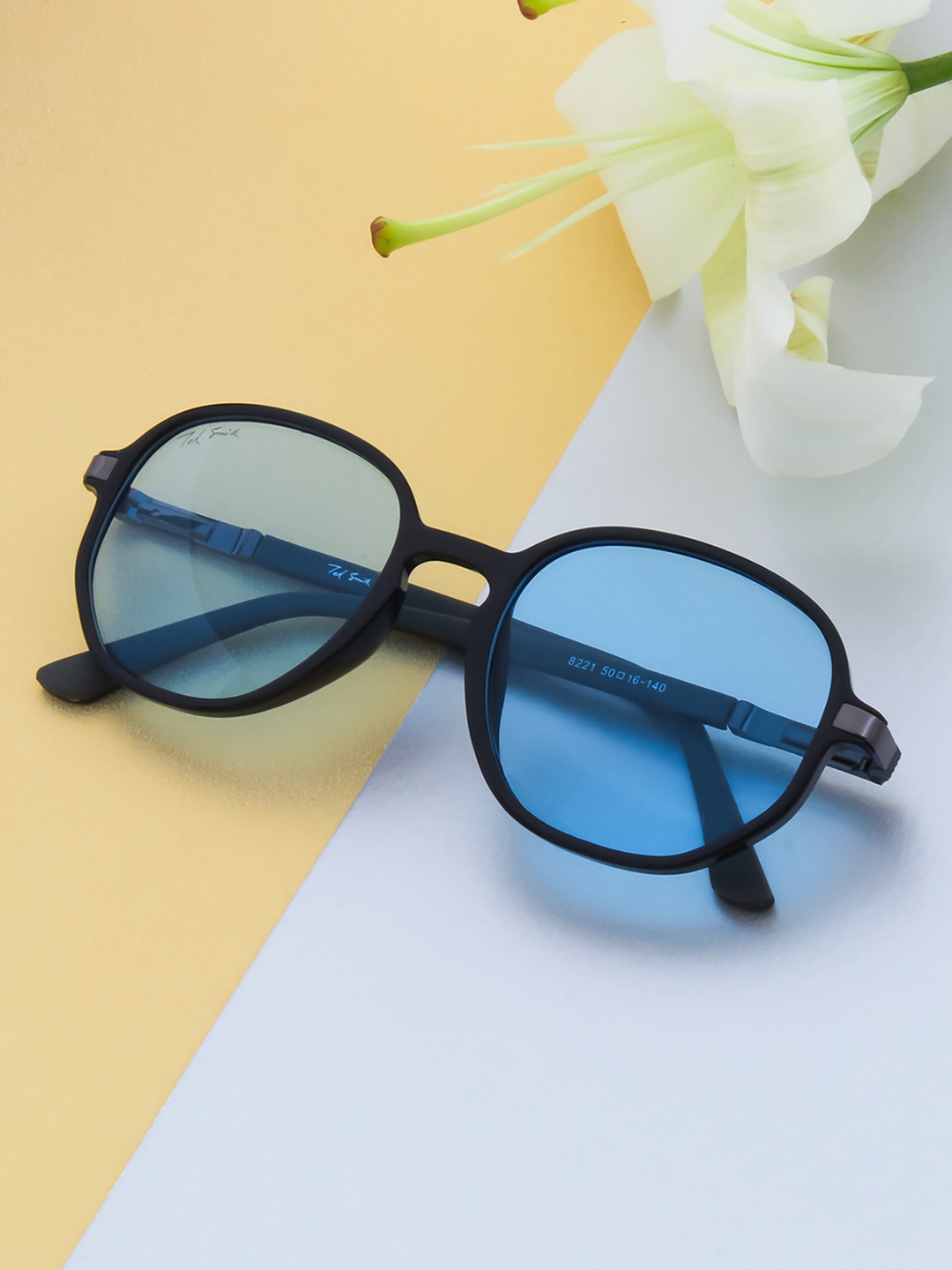 

Ted Smith Unisex Blue Lens & Black Round Sunglasses with UV Protected Lens