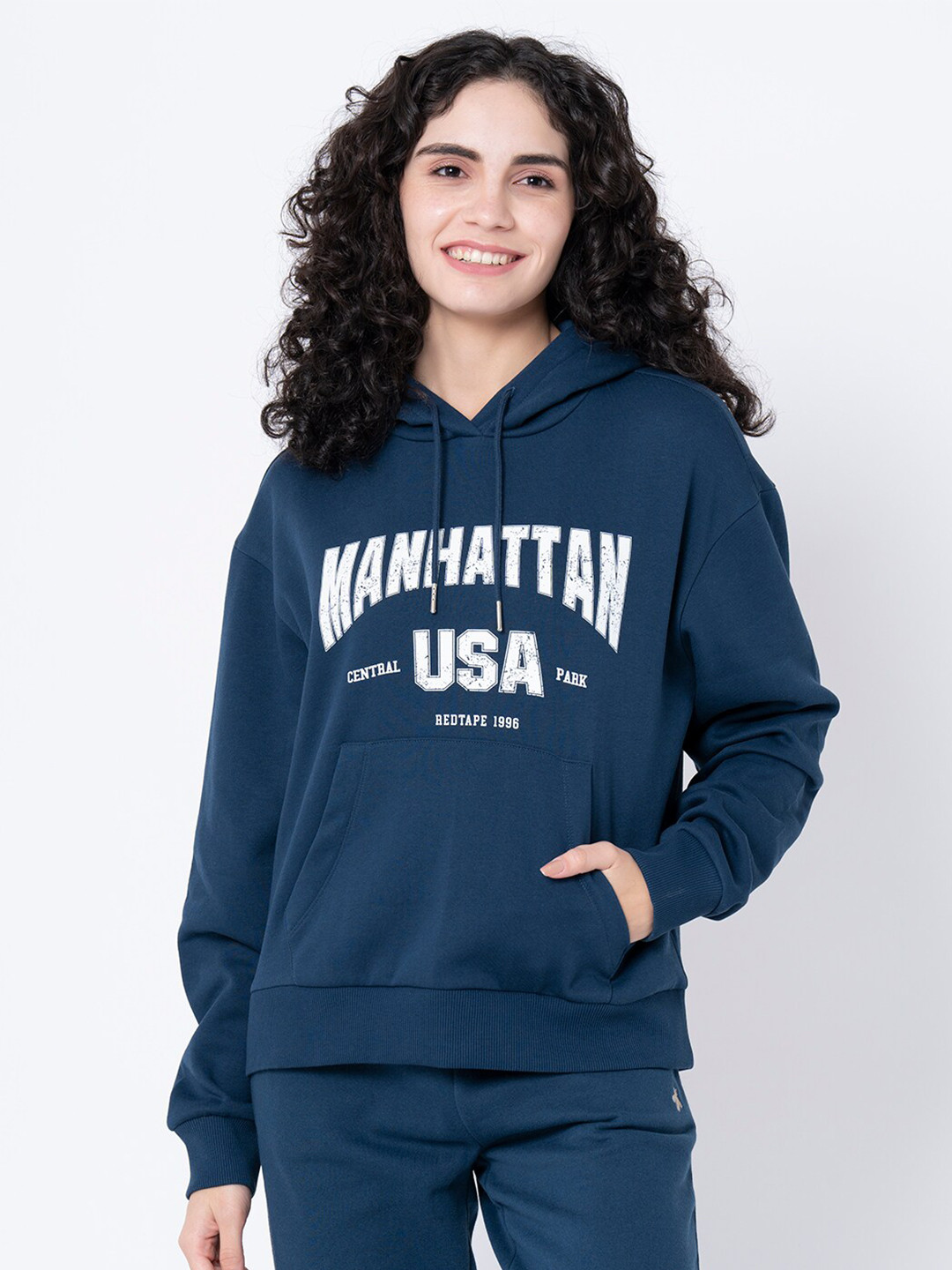 

Mode by Red Tape Women Blue Printed Hooded Sweatshirt