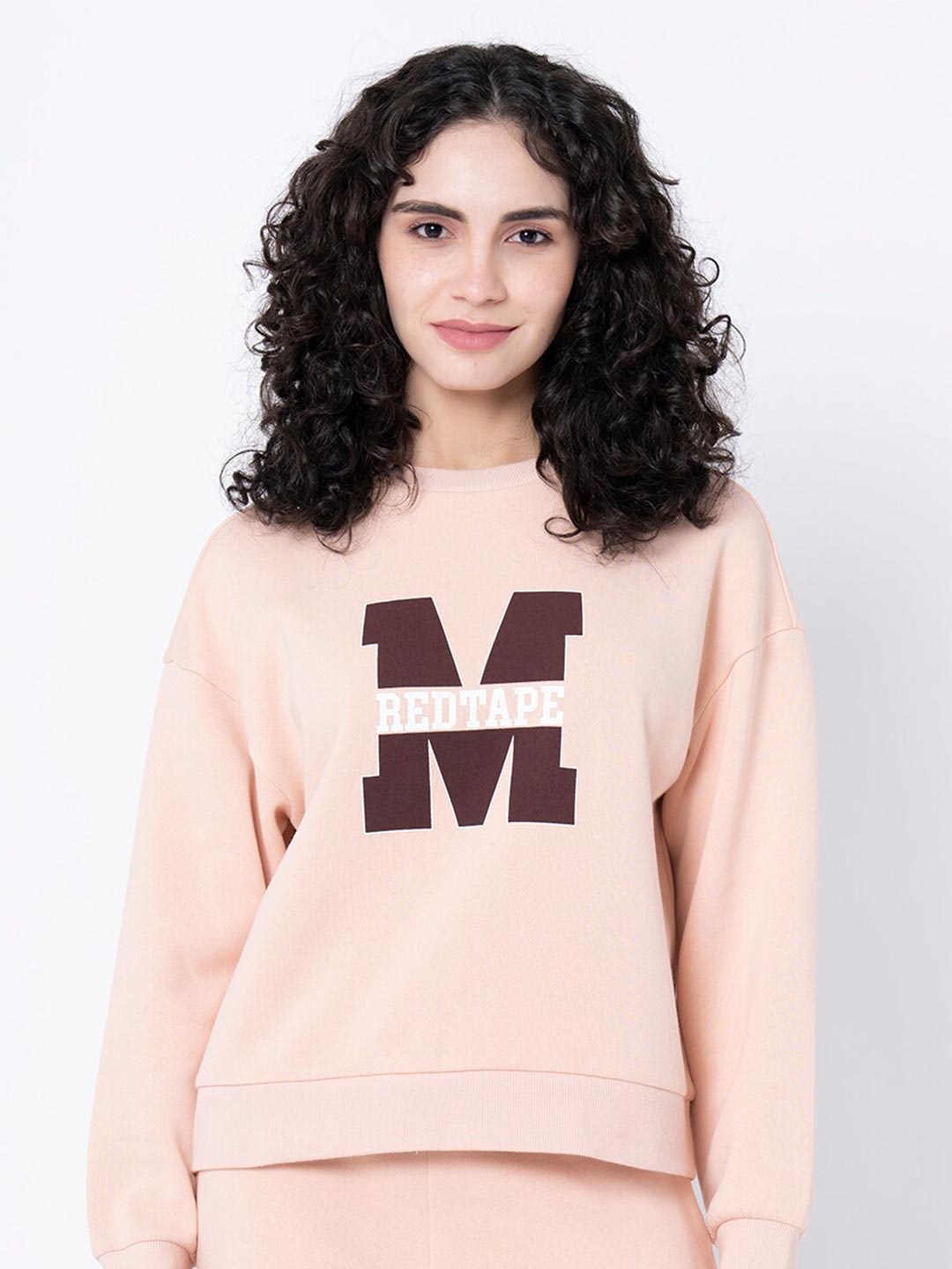 

Mode by Red Tape Women Peach-Coloured Printed Sweatshirt