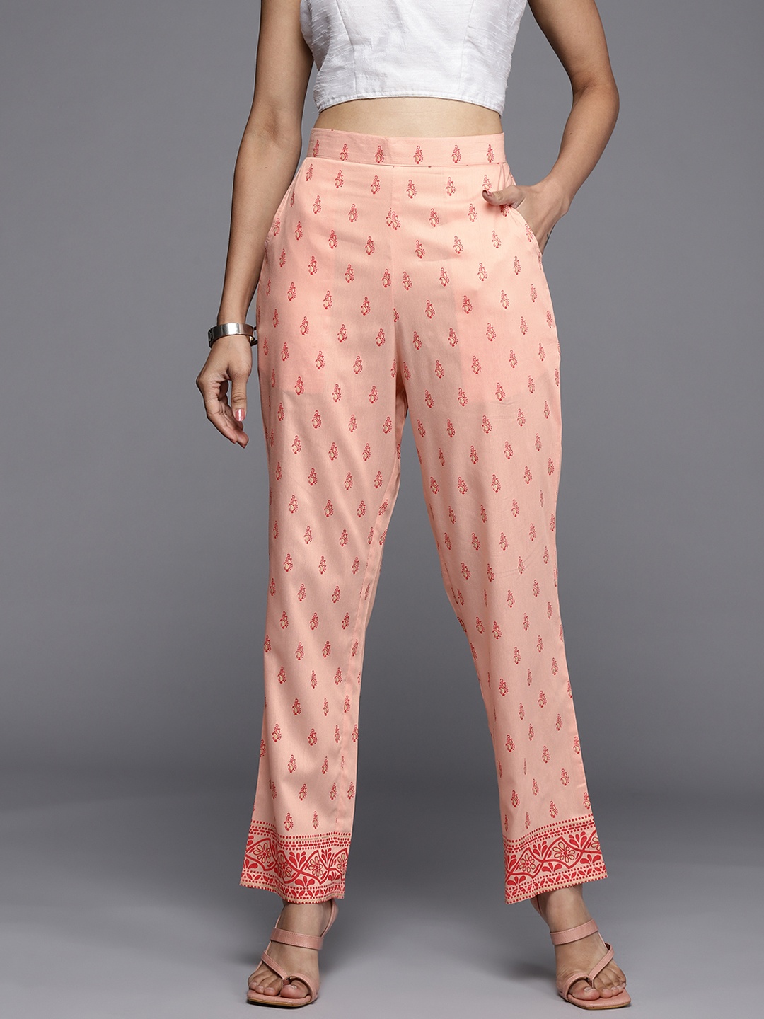 

Libas Women Peach-Coloured Ethnic Motifs Printed Relaxed Straight Leg Loose Fit Trousers