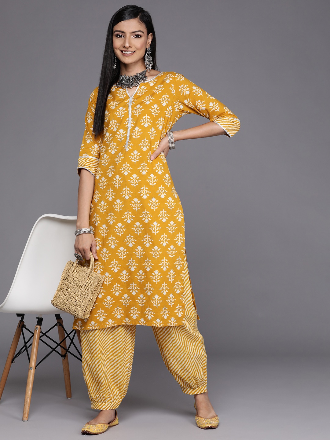 

Libas Women Mustard Yellow & White Floral Printed Gotta Patti Kurta