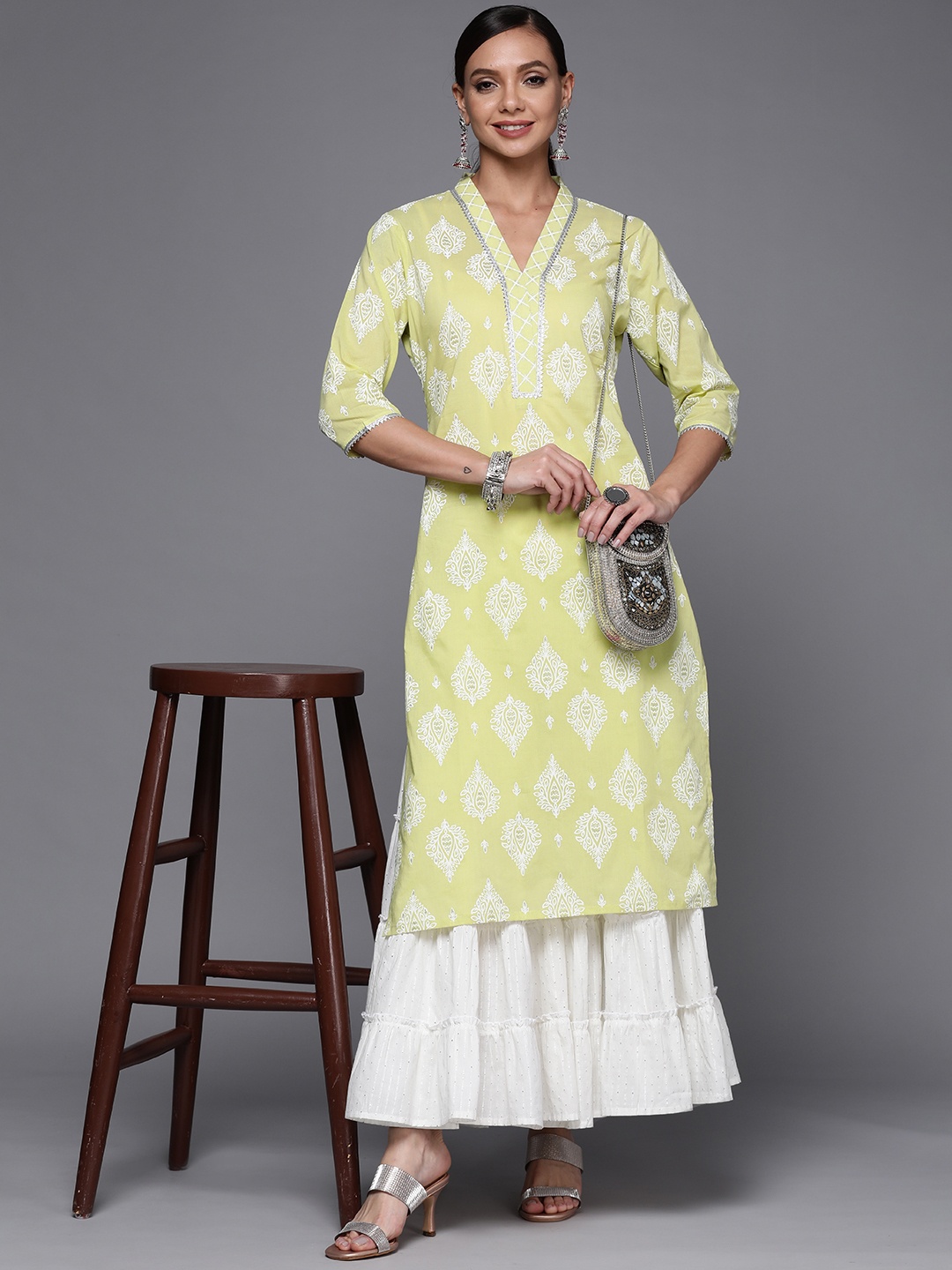 

Libas Women Lime Green & White Floral Motifs Printed Gotta Patti Kurta