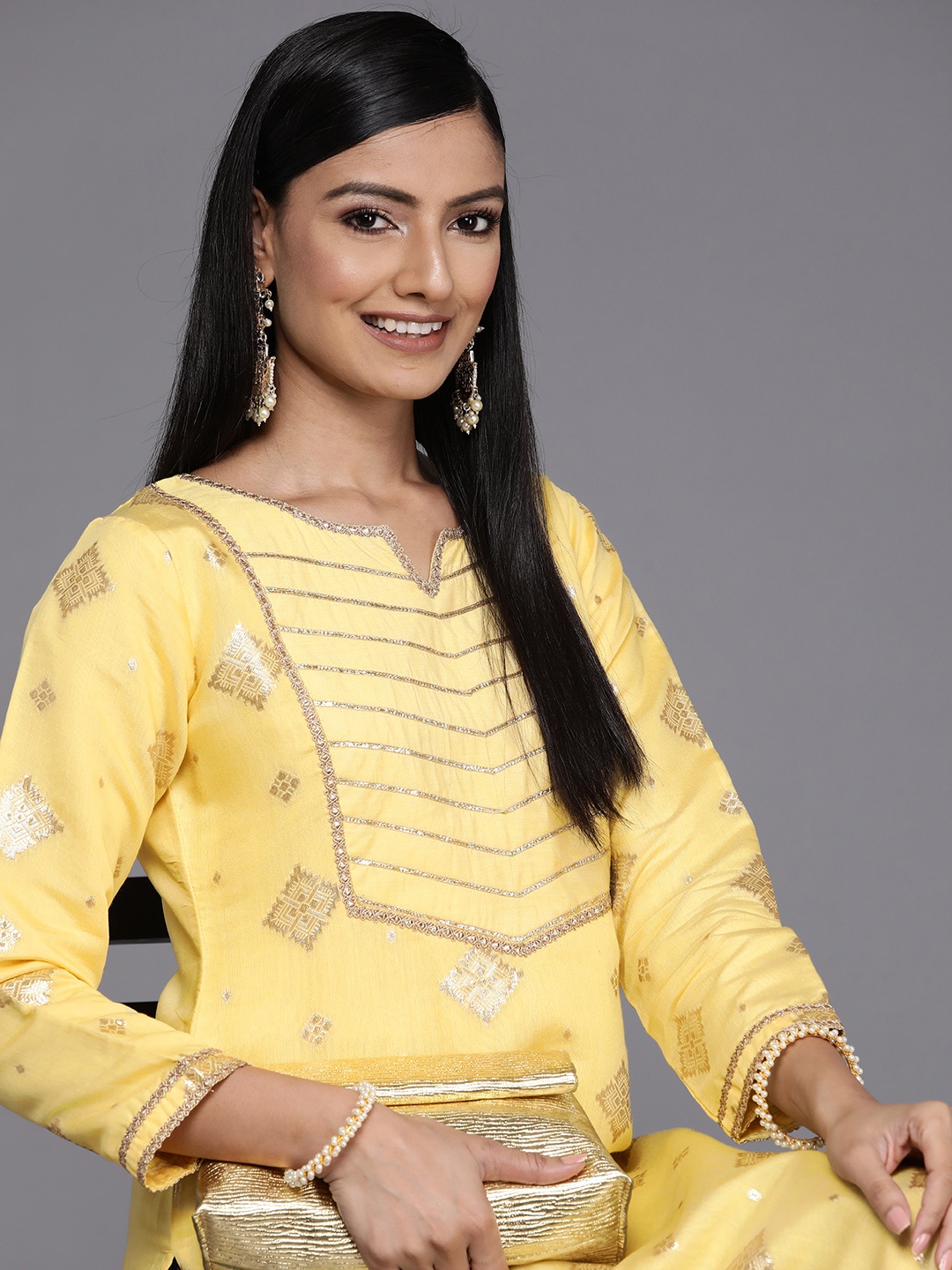 

Libas Women Yellow & Golden Ethnic Motifs Woven Design Chanderi Silk Kurta