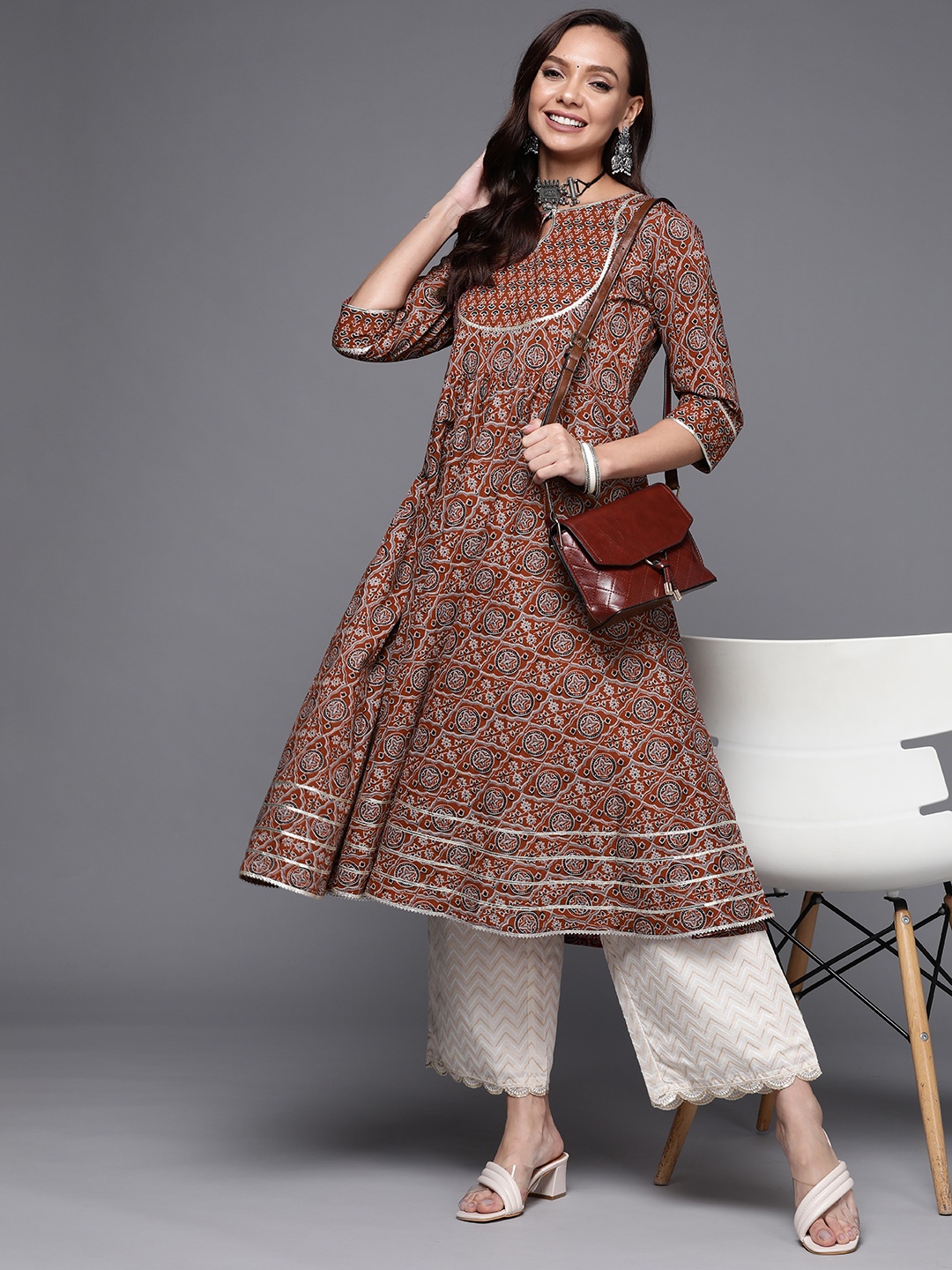 

Libas Women Maroon & Beige Ethnic Motifs Printed Keyhole Neck Gotta Patti Anarkali Kurta