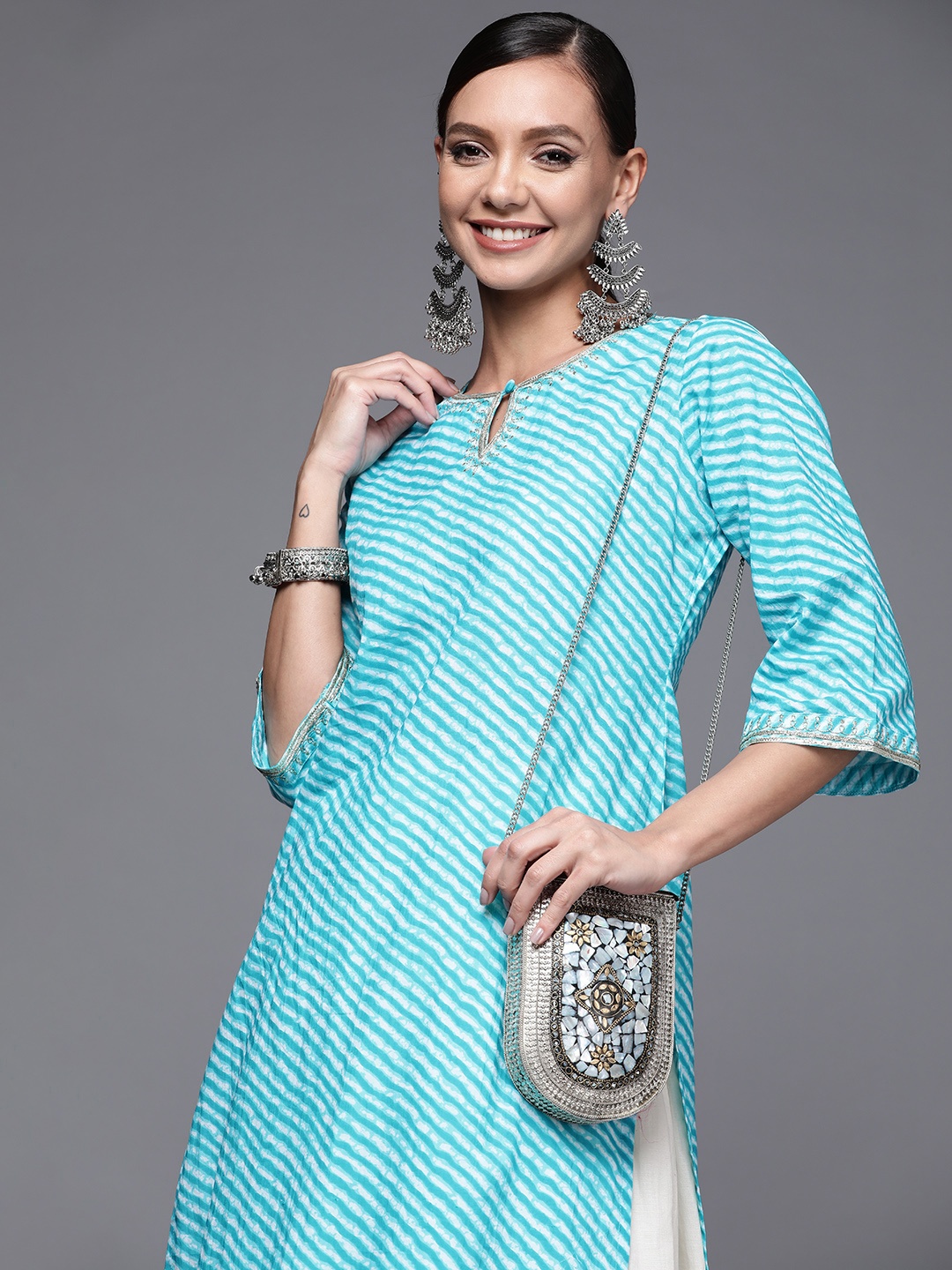 

Libas Women Blue Striped Keyhole Neck Flared Sleeves Gotta Patti Kurta