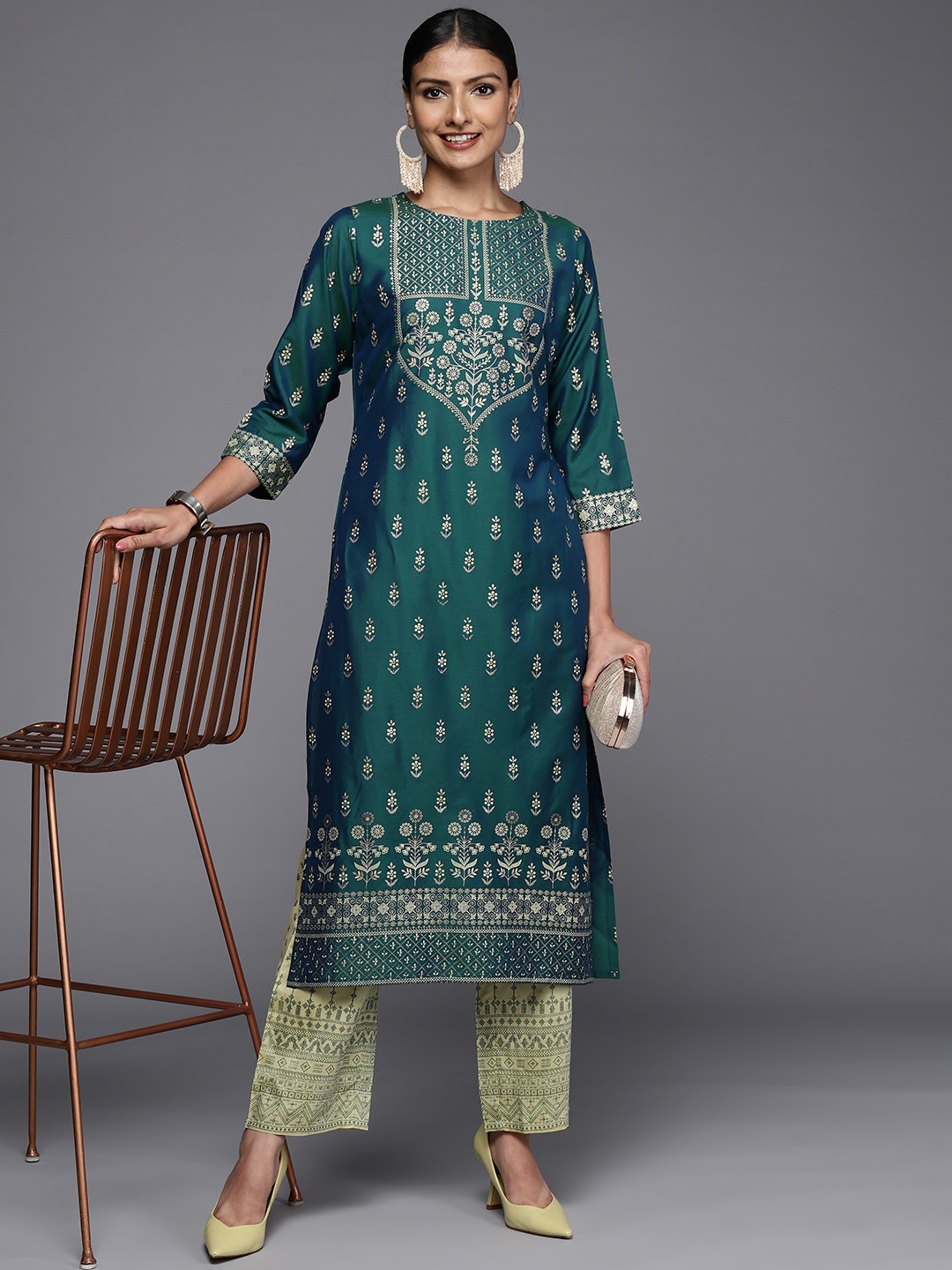 

Libas Women Teal Floral Yoke Design Boat Neck Kurta