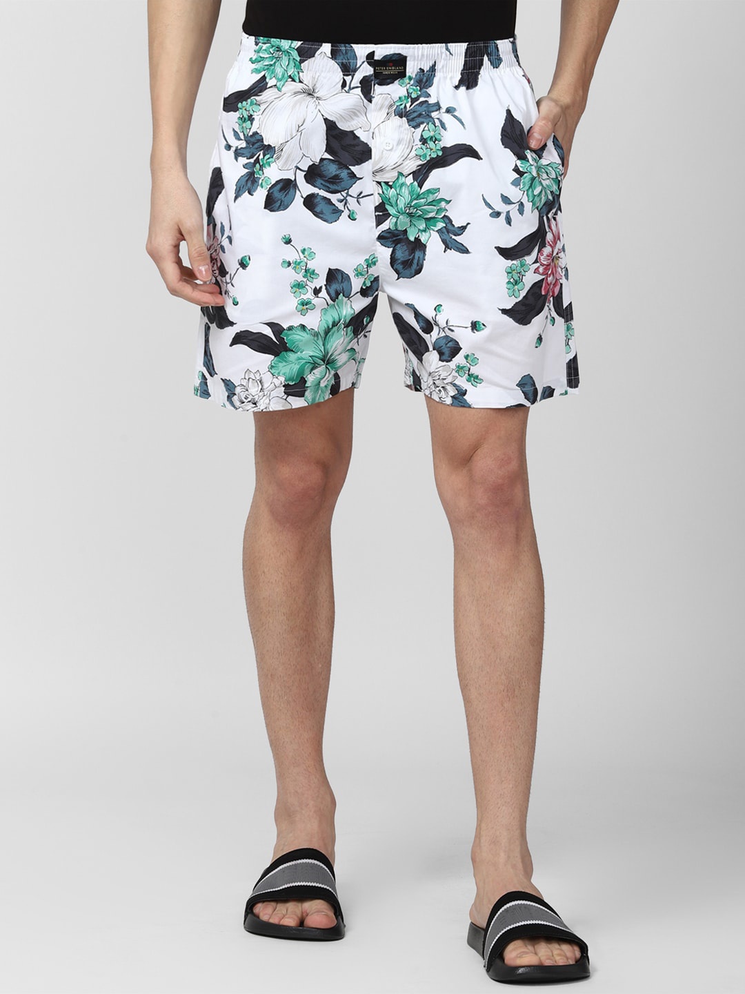 

Peter England Men White Floral Printed Shorts