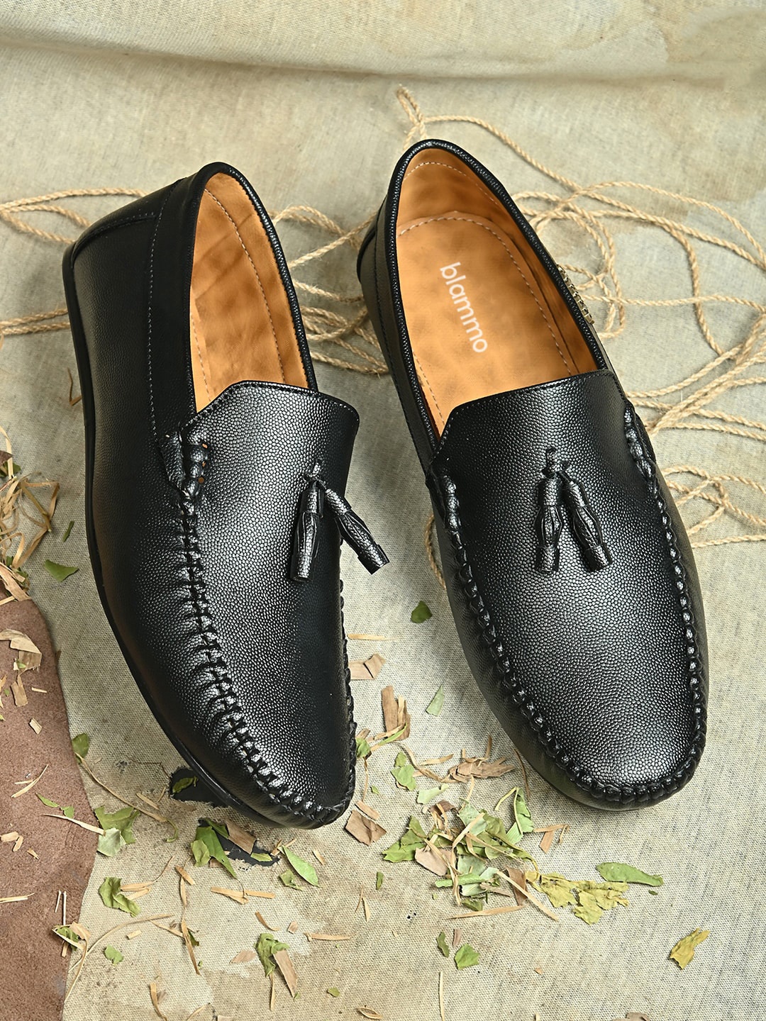 

Blammo Men Black Solid Textured Loafers