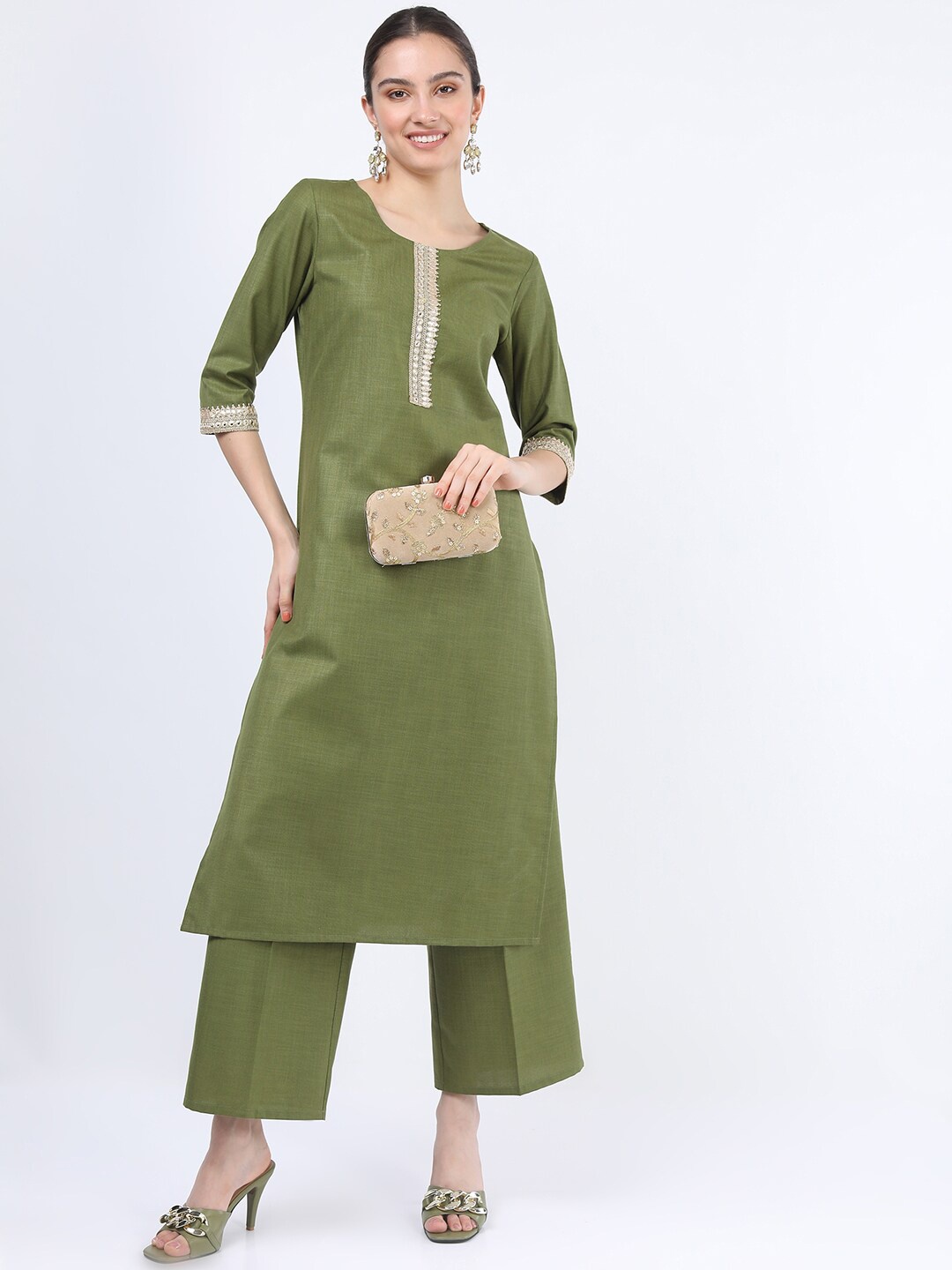 

Vishudh Women Green Straight Kurta With Palazzos