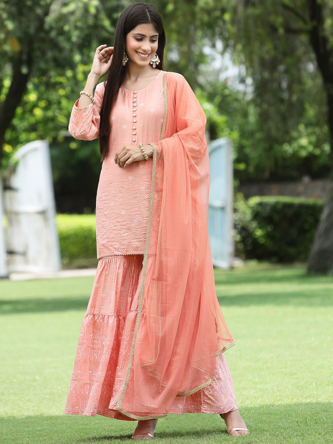 

Juniper Women Peach-Coloured Ethnic Motifs Embroidered Kurti with Palazzos & With Dupatta