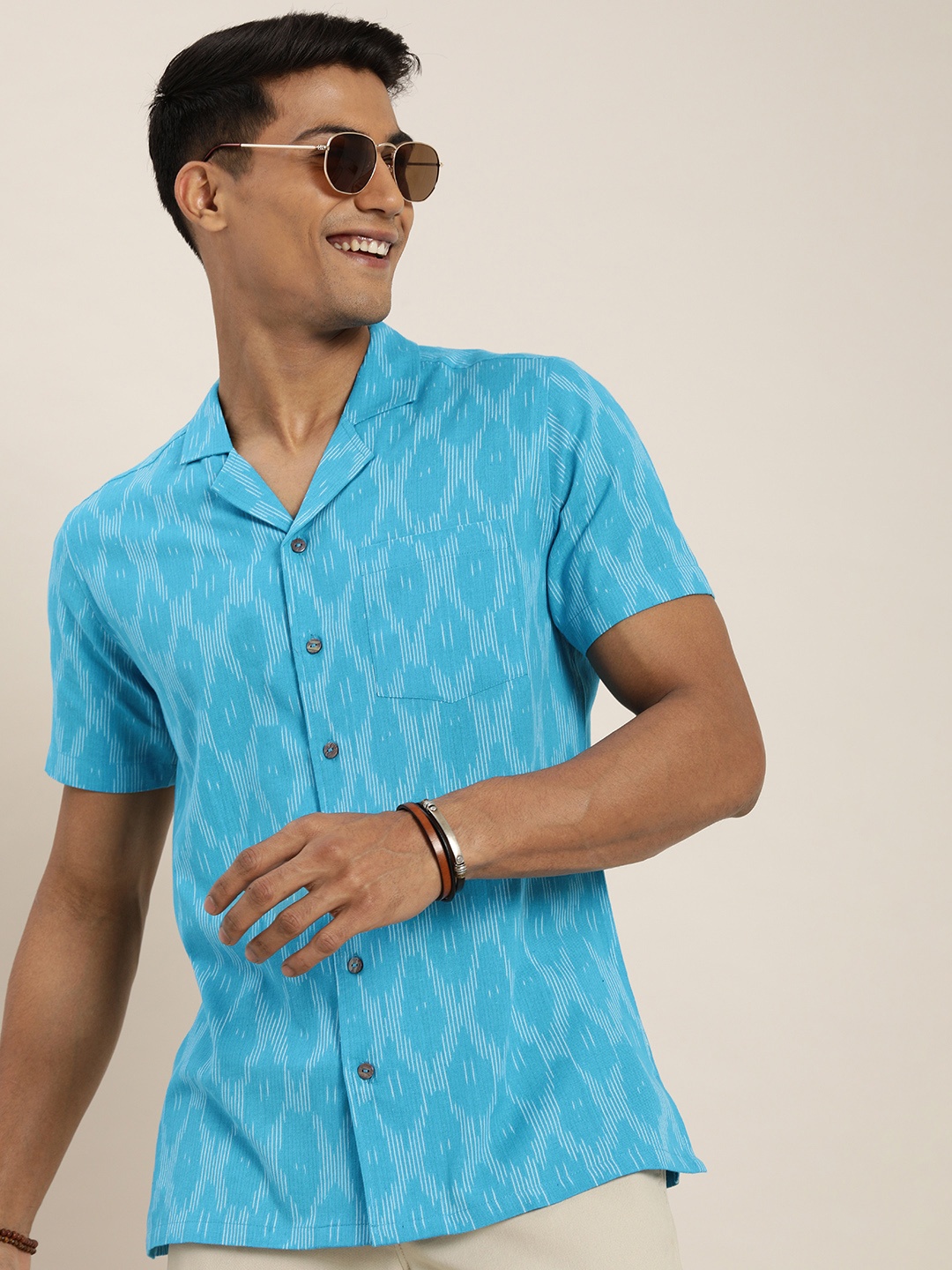 

Taavi Men Ikat Printed Cuban Collar Casual Shirt, Blue