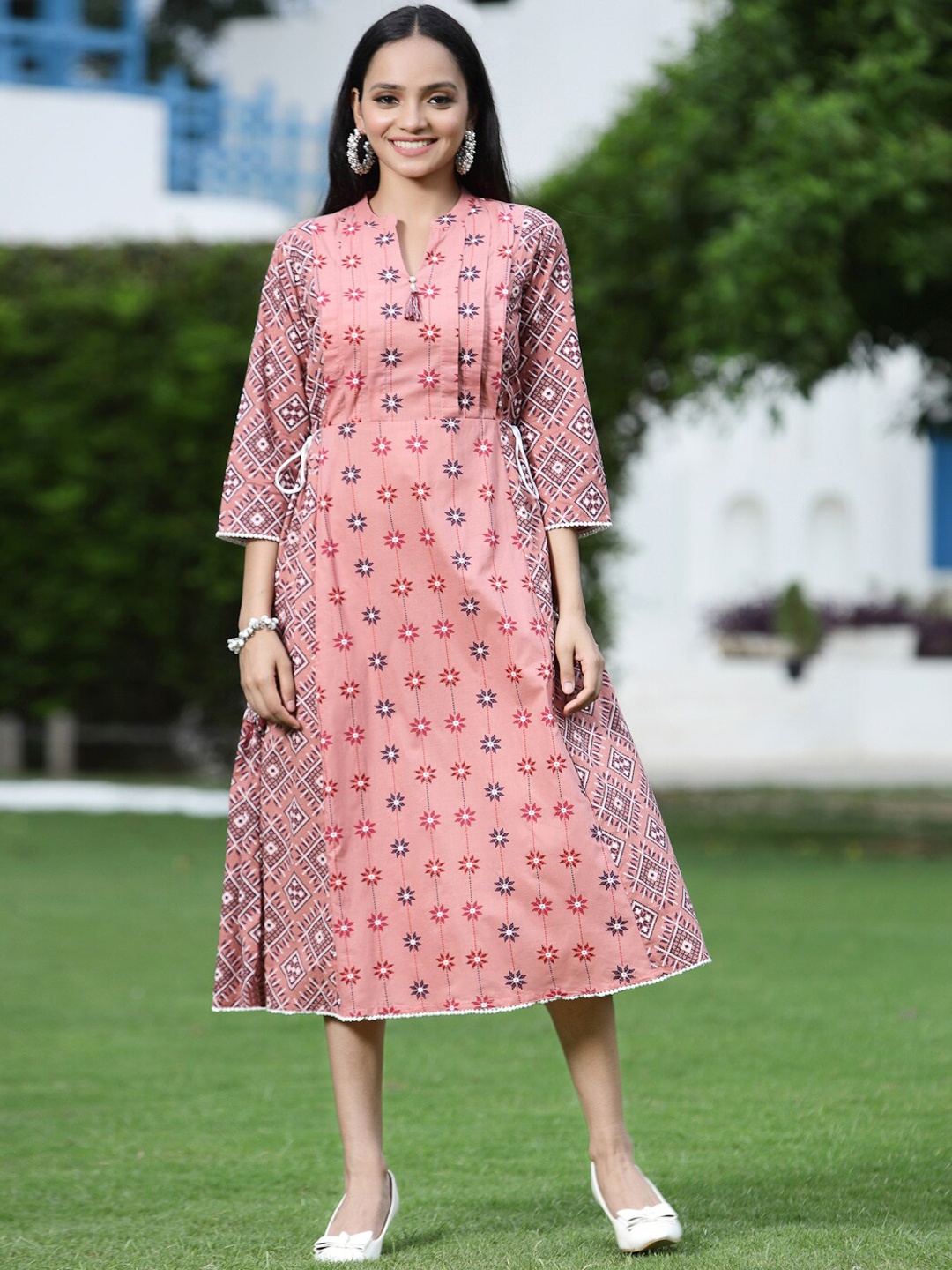 

Juniper Women Peach-Coloured Geometric Dyed Flared Sleeves Kurta