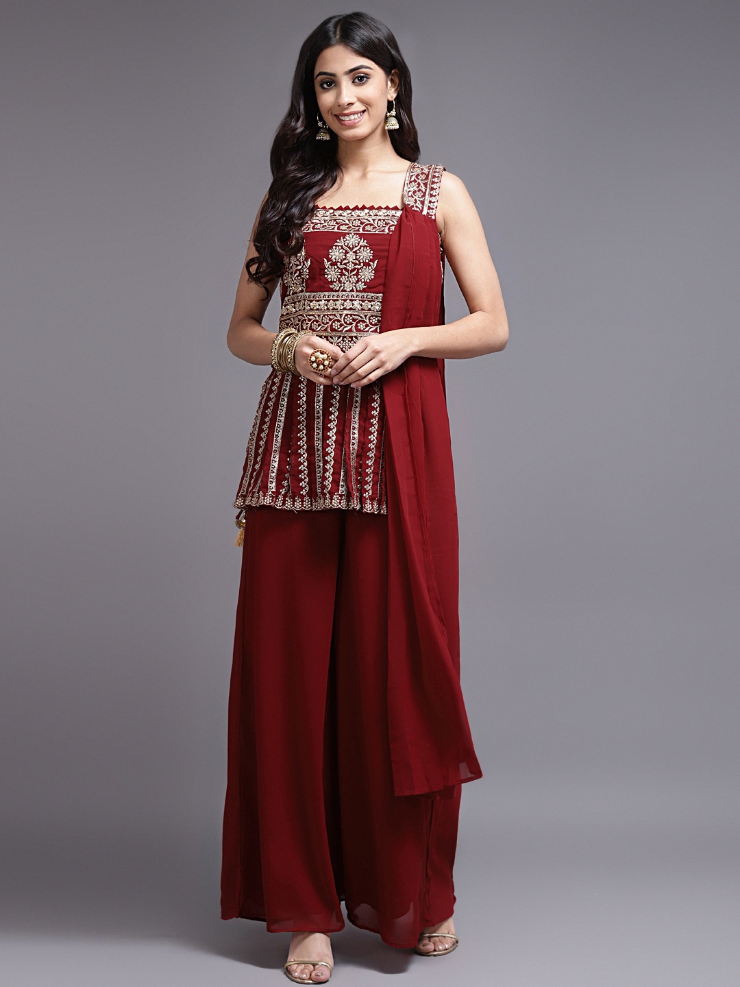 

SAARYA Women Maroon Embroidered Panelled Kurti with Palazzos