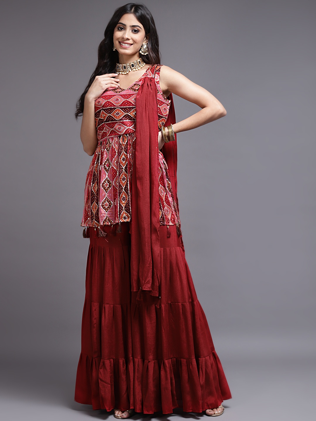 

SAARYA Women Red Embroidered Layered Kurti with Sharara & With Dupatta