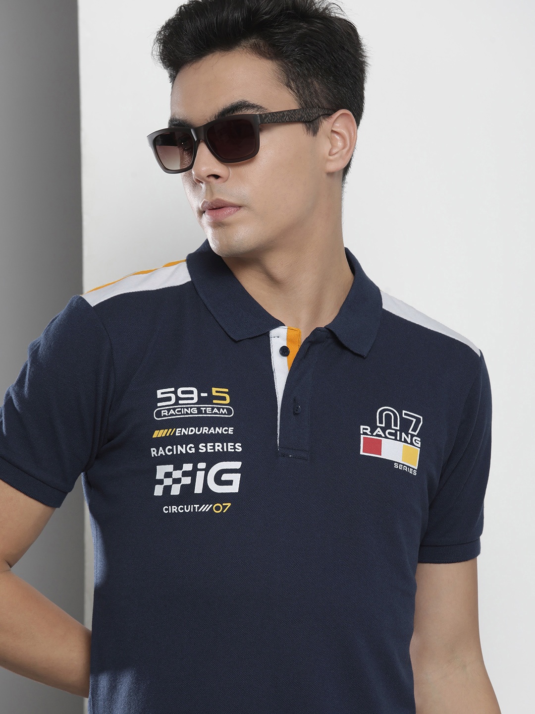 

The Indian Garage Co Men Navy Blue Typography Printed Polo Collar T-shirt