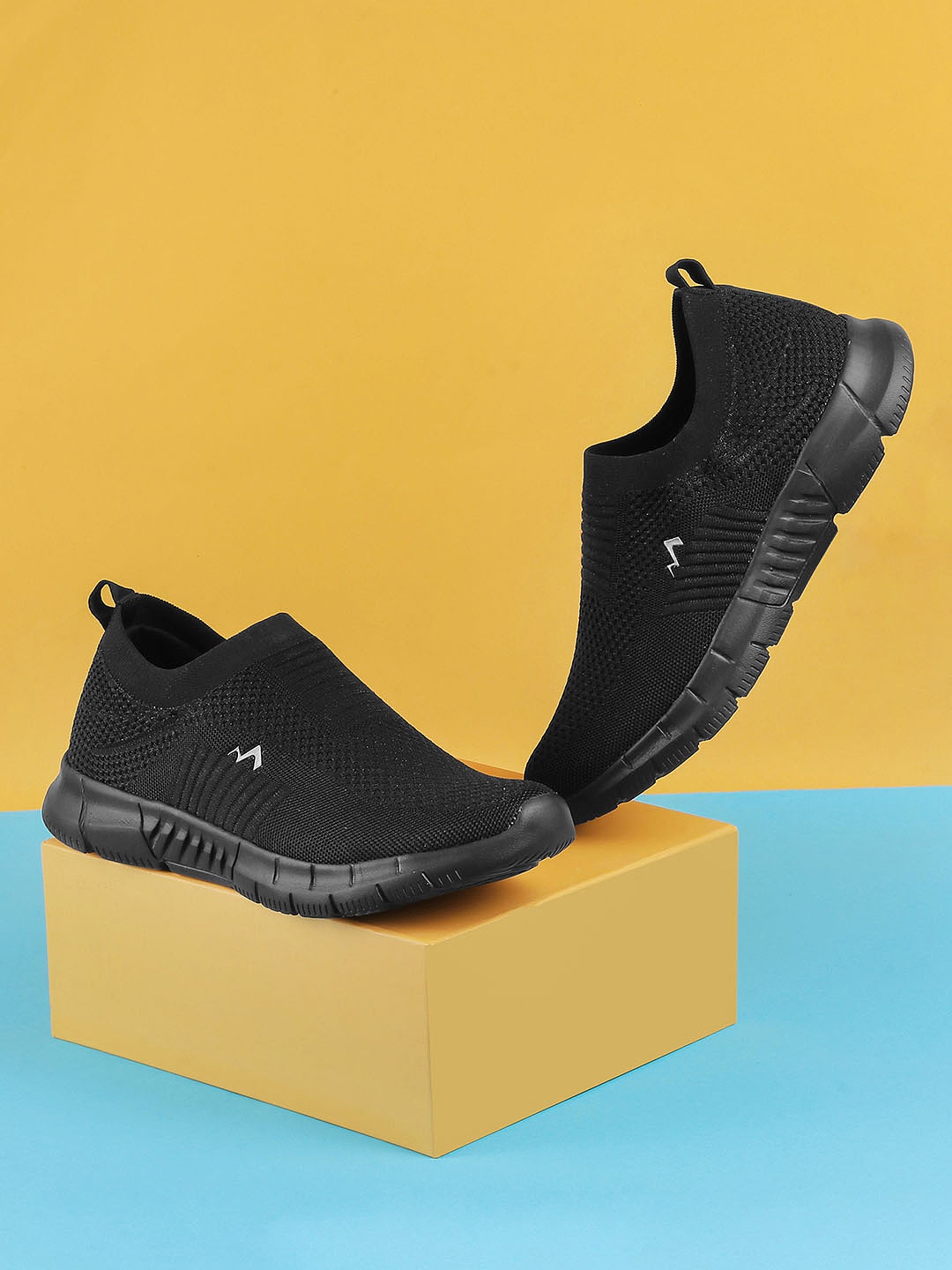 

Metro Men Green Woven Design Slip-On Sneakers