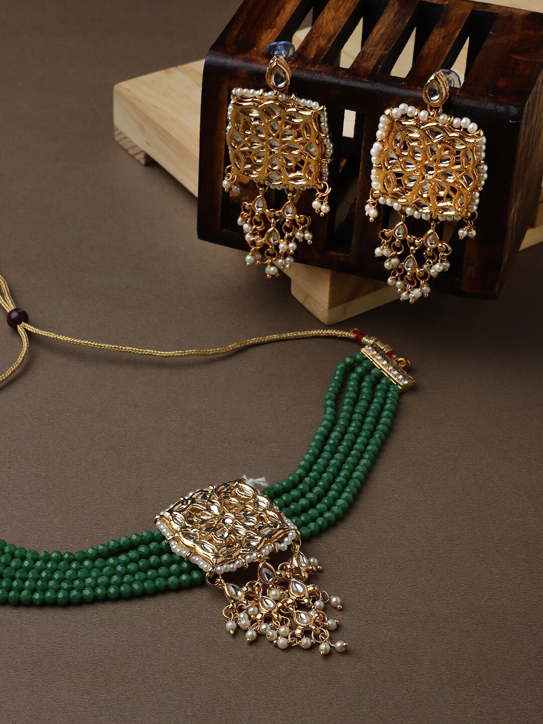 

CARDINAL Gold-Toned Green Kundan Studded & Beaded Choker Jewellery Set