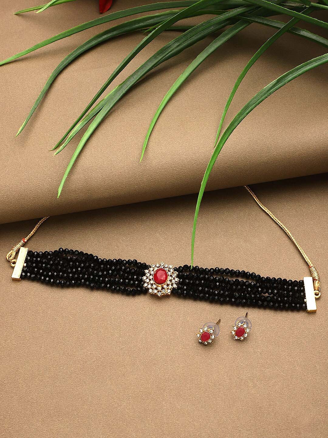 

CARDINAL Black & Red Kundan Studded & Beaded Silver Jewellery Set