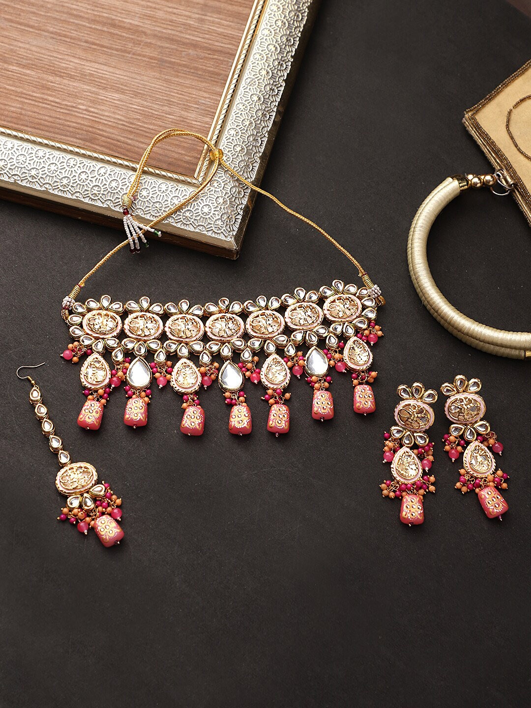 

CARDINAL Women Gold-Toned Peach & White Kundan Studded Bridal Jewellery Set