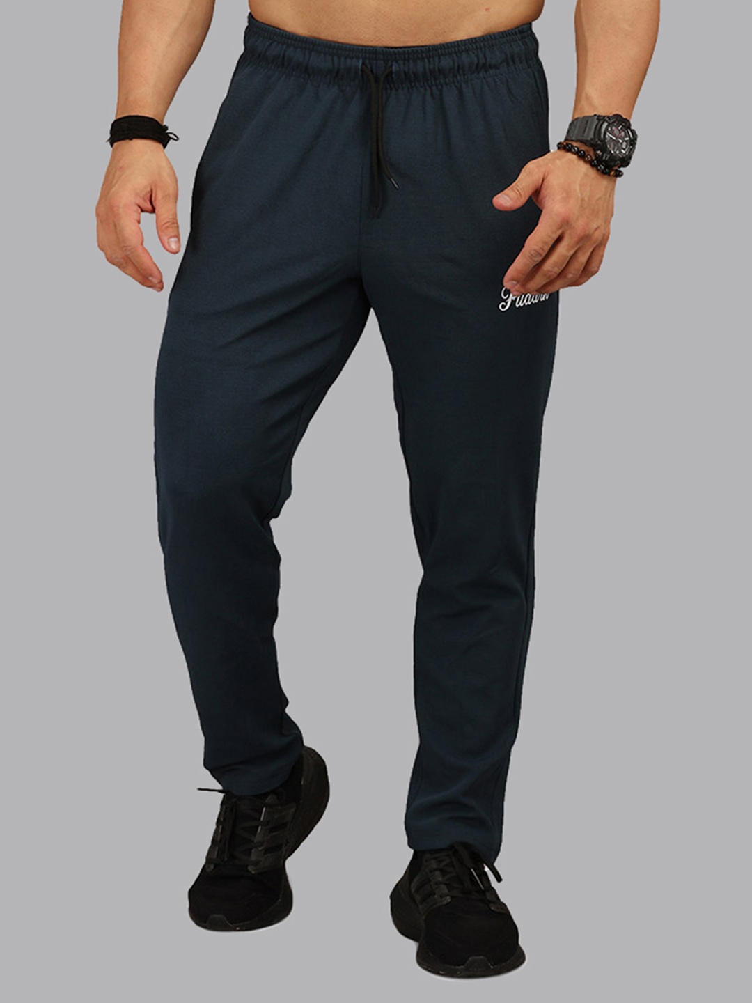

FUAARK Men Teal Green Solid Track Pants