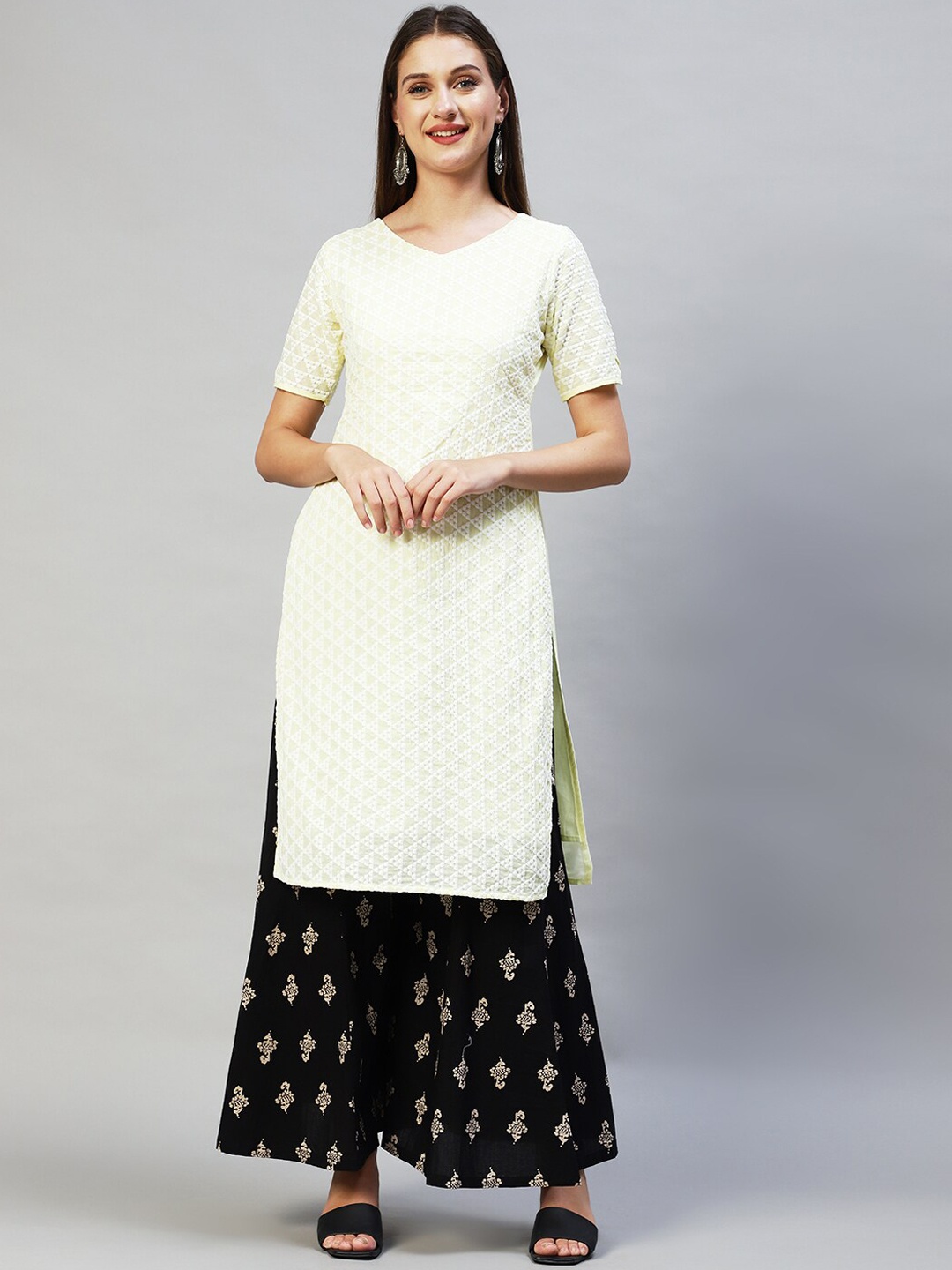 

FASHOR Women Yellow Ethnic Motifs Printed Thread Work Kurta