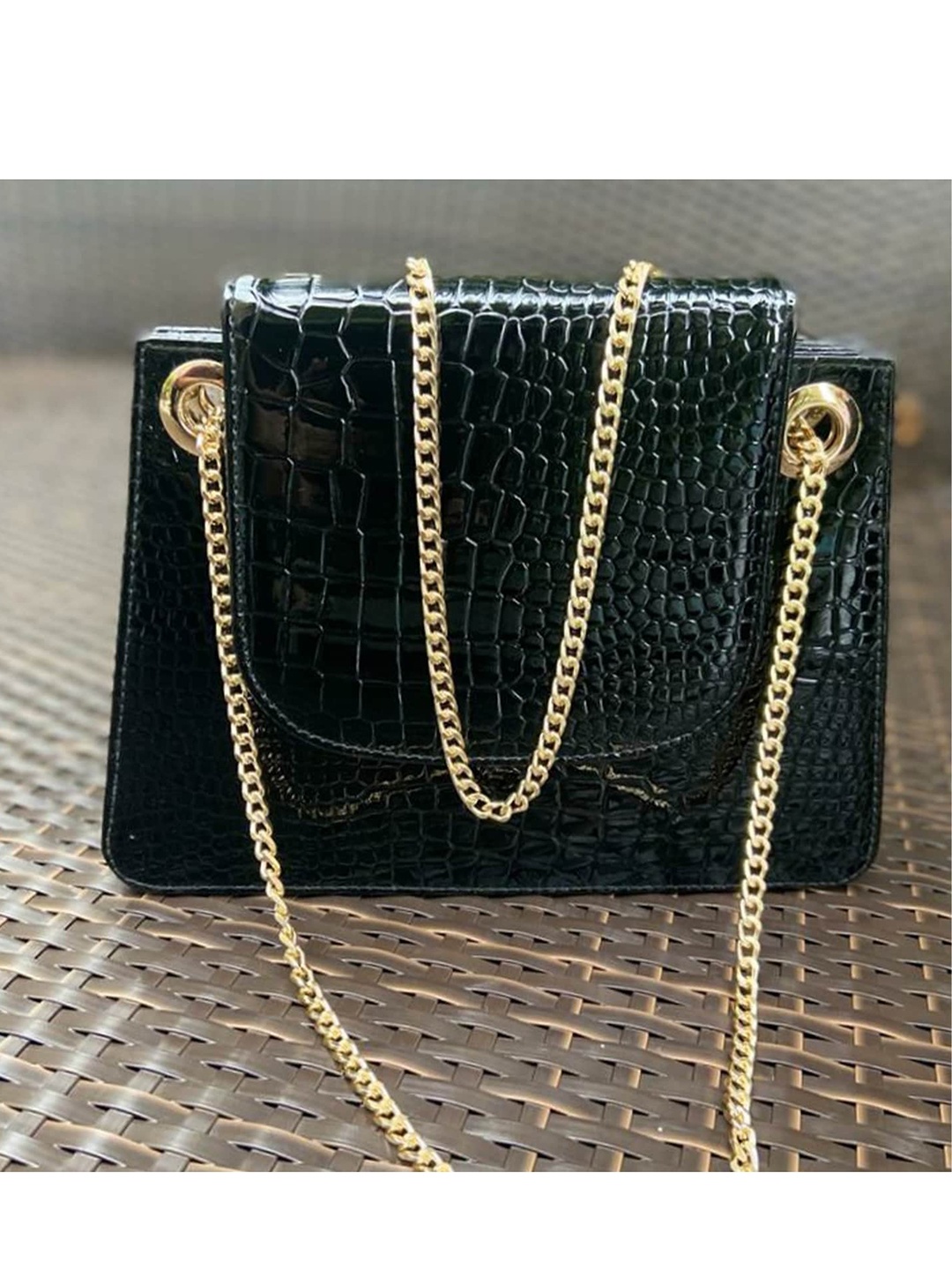 

Angeline Women Black Textured Structured Sling Bag